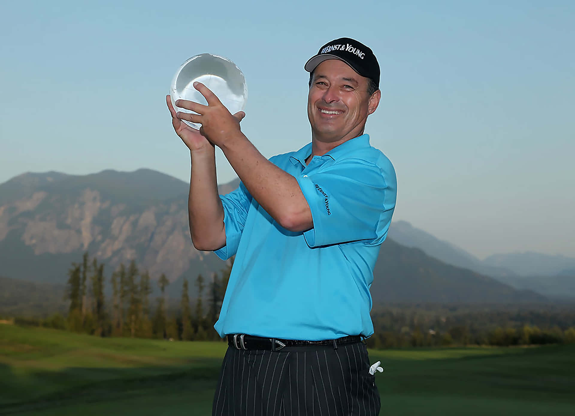 Loren Roberts Displaying Boeing Classic Trophy Background