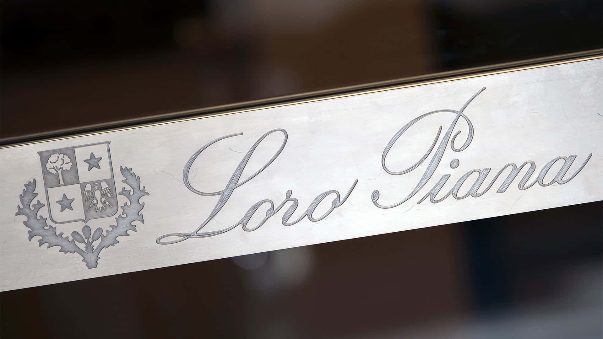 Loro Piana Metal Nameplate Background