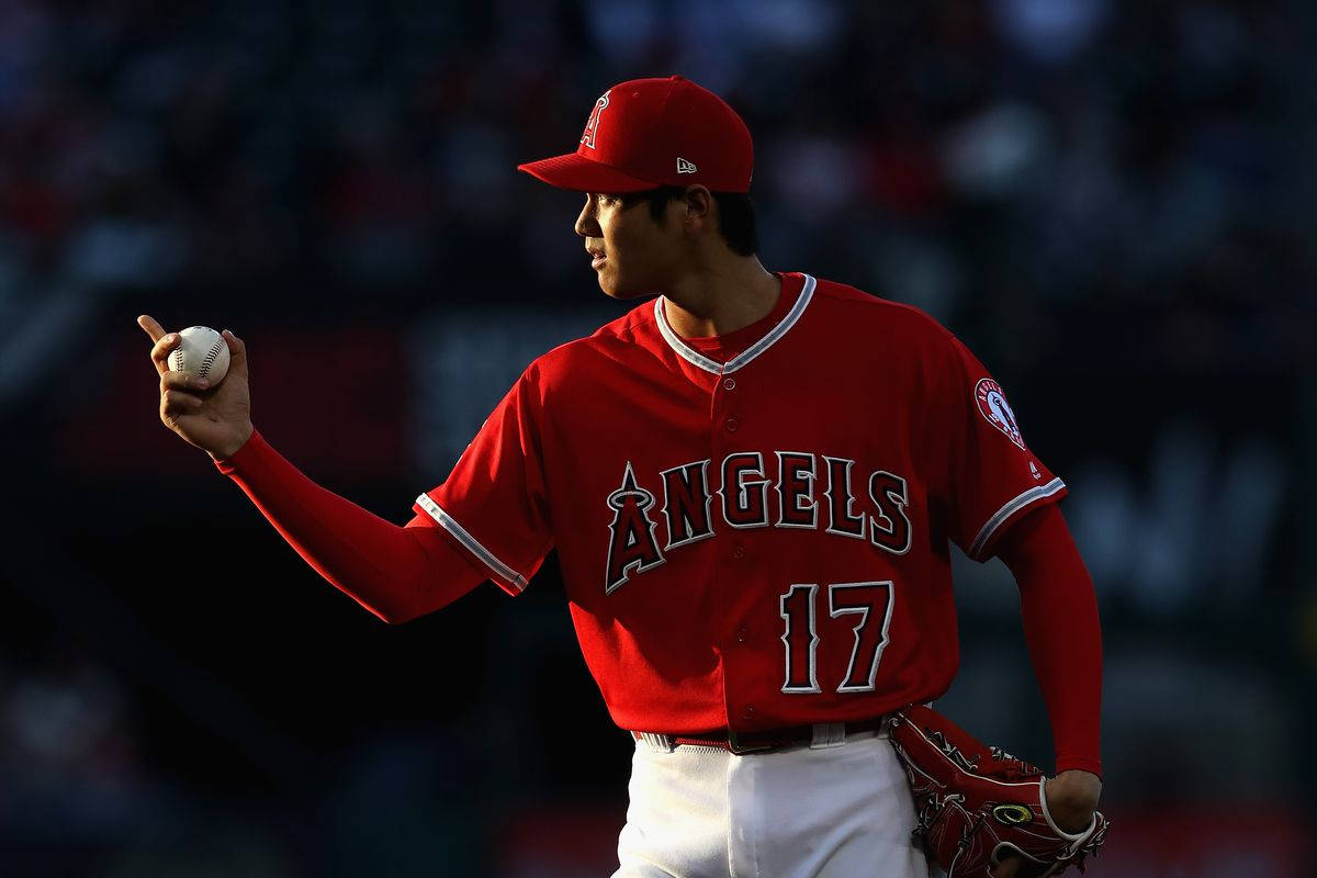 Los Angeles Angels Shohei Ohtani Holding Baseball Background