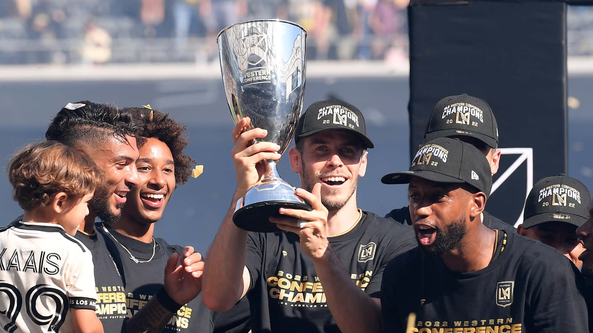 Los Angeles Fc Gareth Bale Holding The Championship Trophy Background