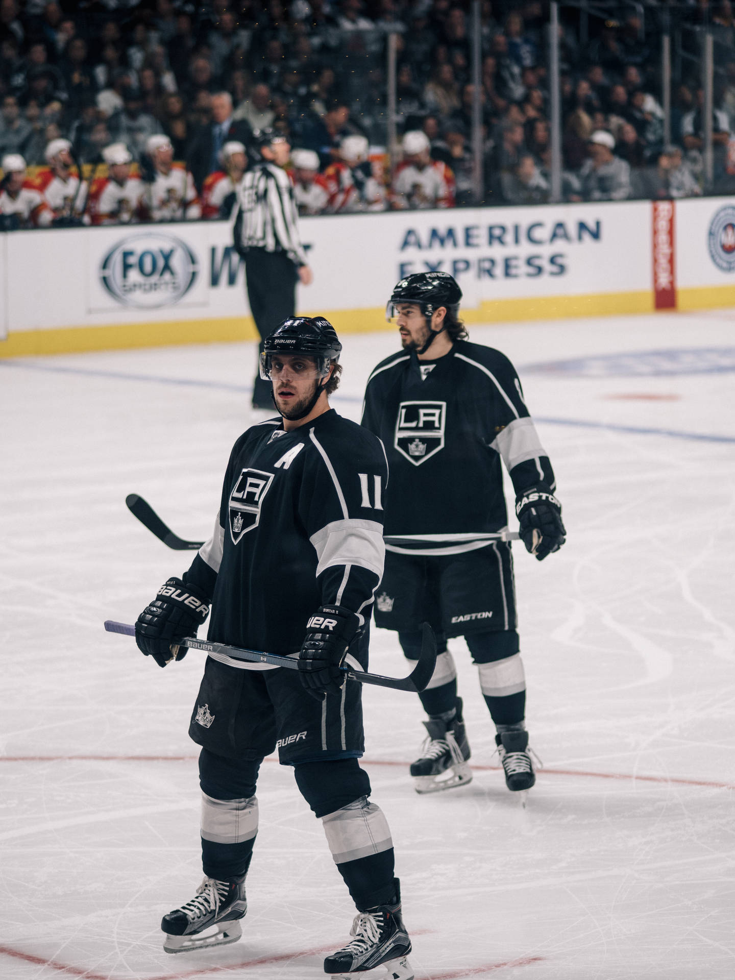 Los Angeles Kings' Stars Anze Kopitar And Drew Doughty In Action Background