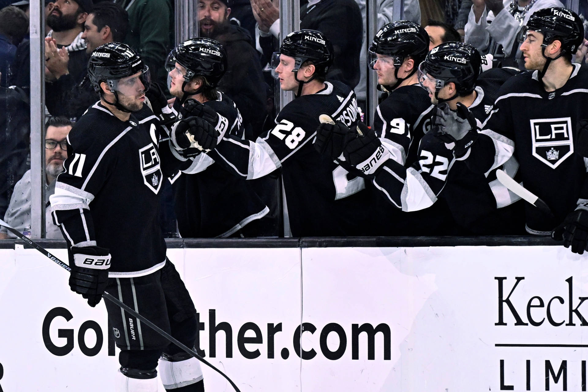 Los Angeles Kings Team Congratulating Anze Kopitar Background