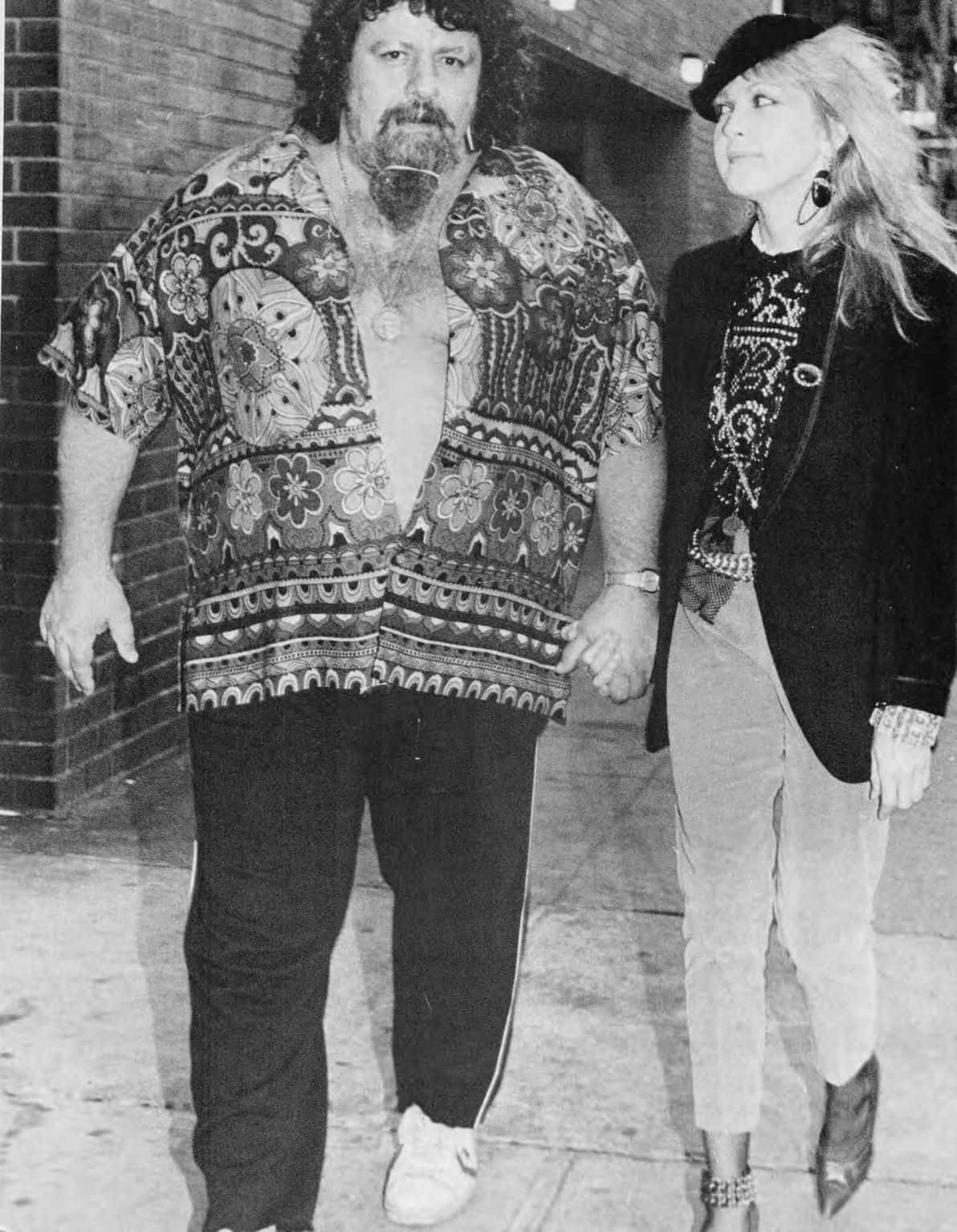 Lou Albanoand Companion Walking Background