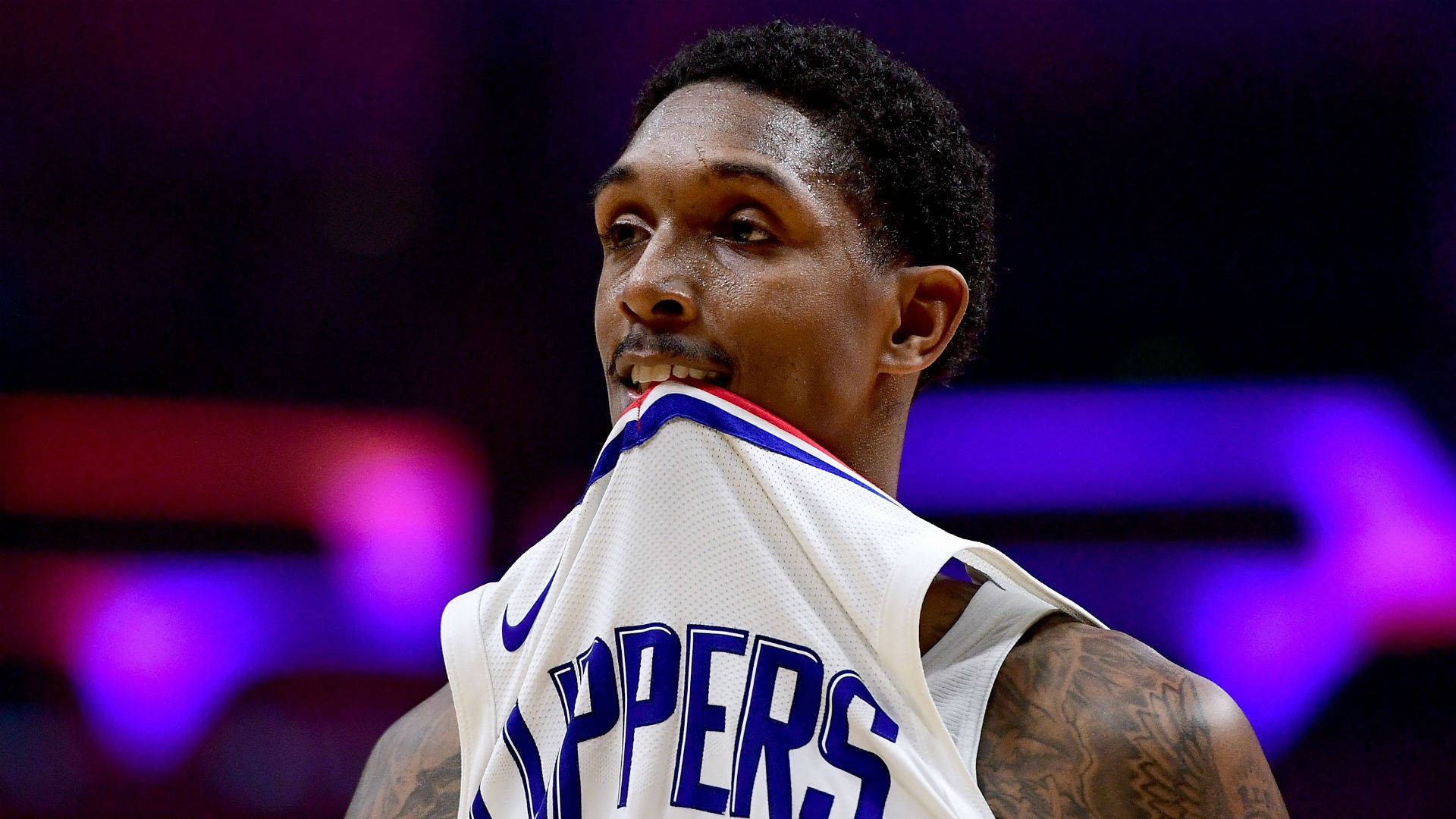 Lou Williams Bitting His Jersey Background