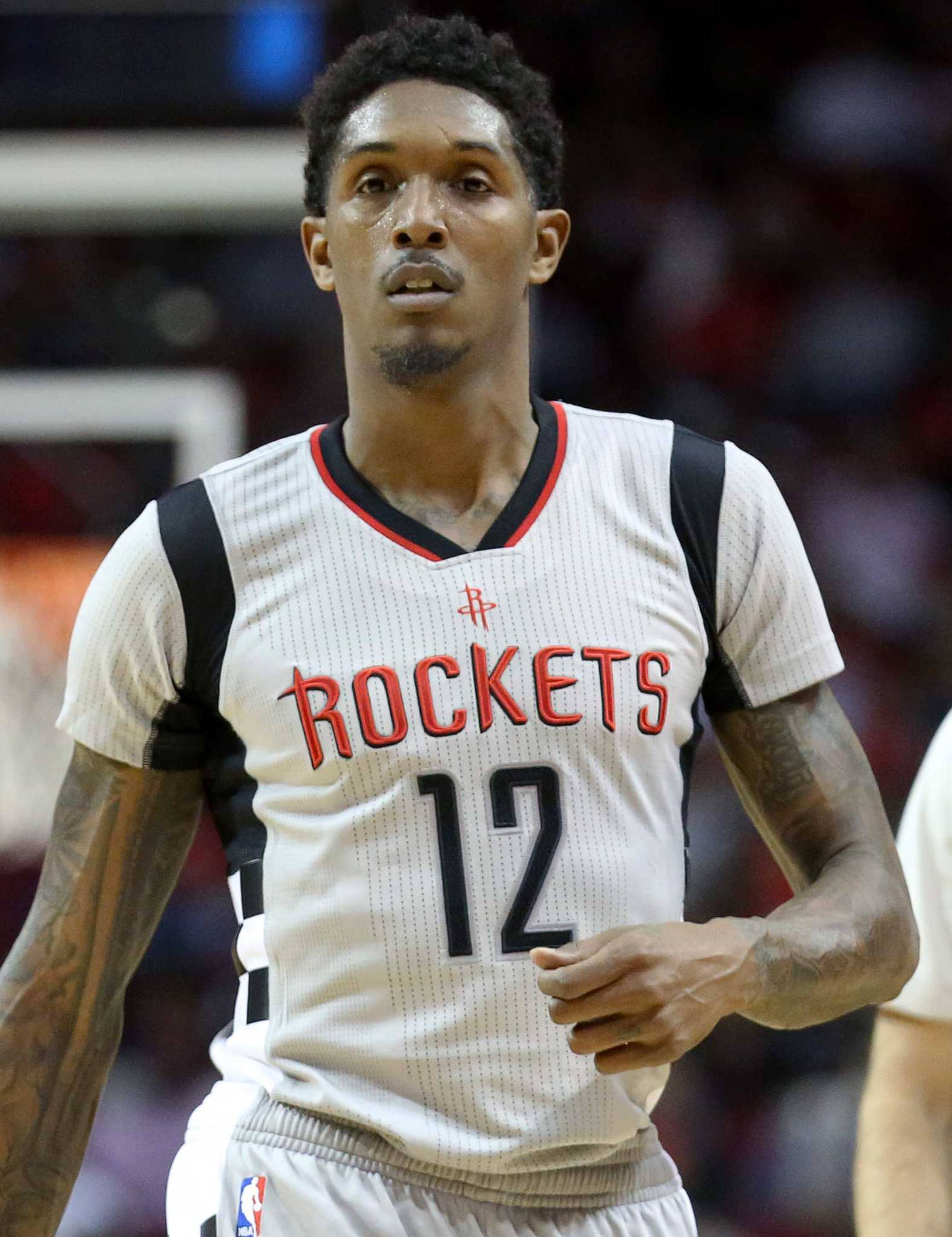 Lou Williams In Action For The Rockets Background