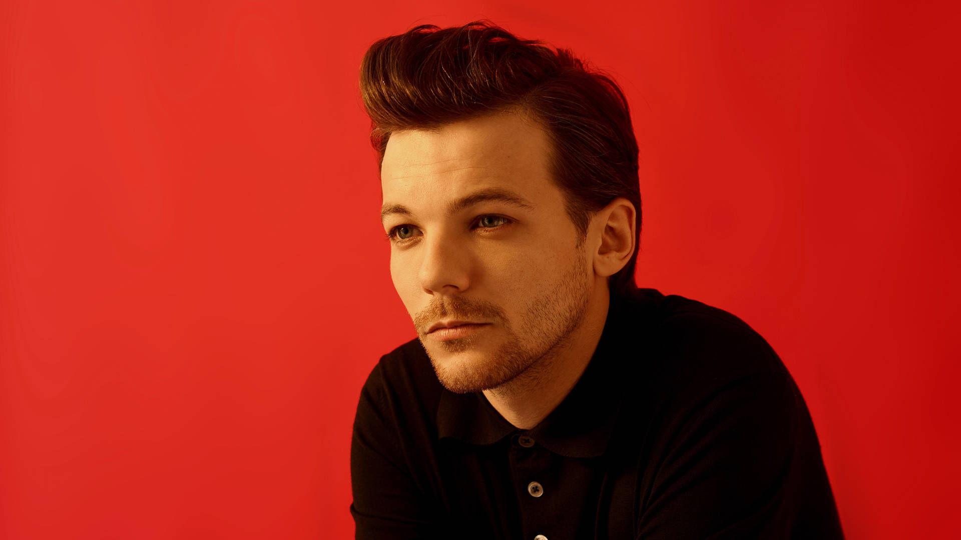 Louis Tomlinson In Black Sweater Background