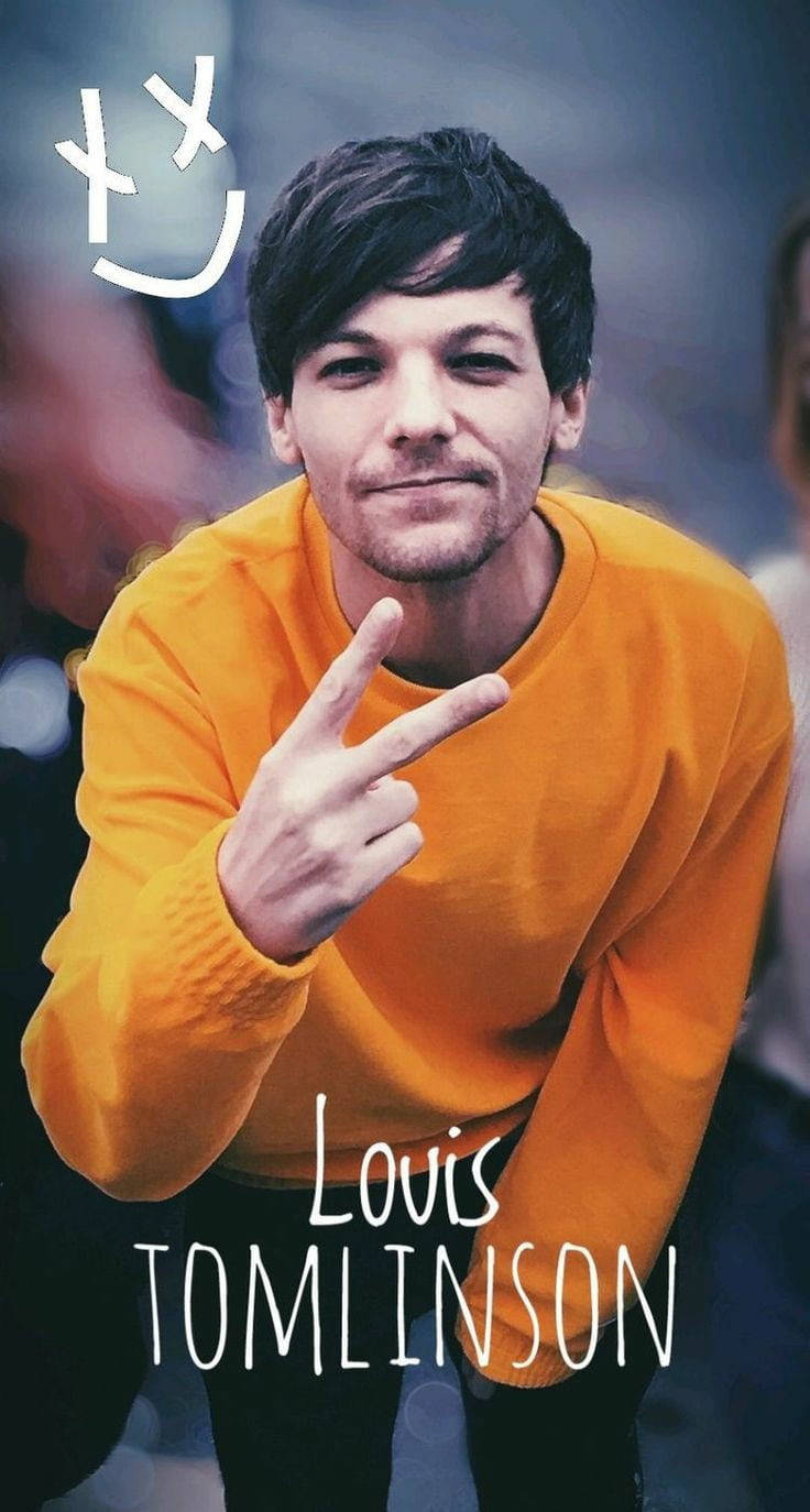 Louis Tomlinson Wearing A Yellow Sweater Background