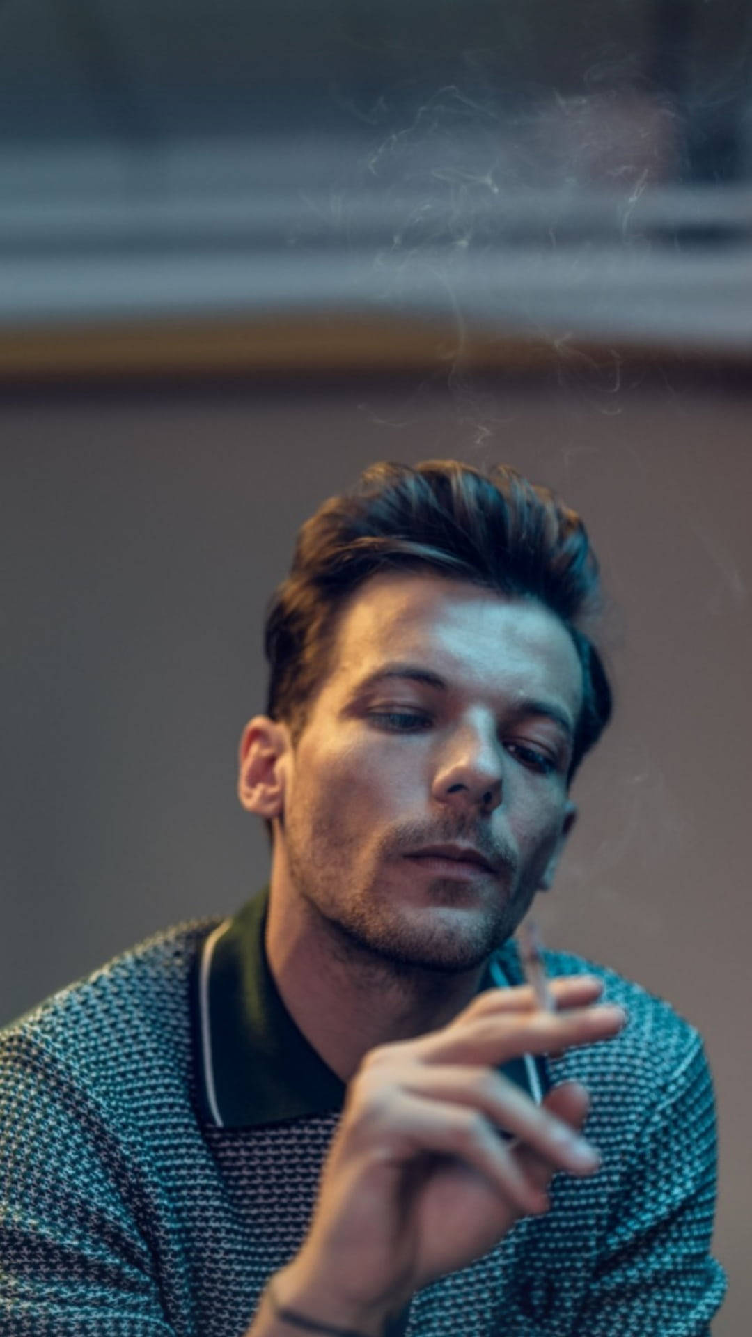Louis Tomlinson With A Cigarette Background
