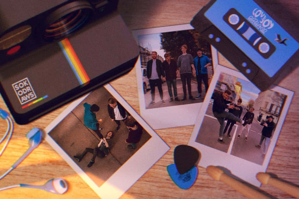 Love Joy Cassette Tape And Polaroid Photographs