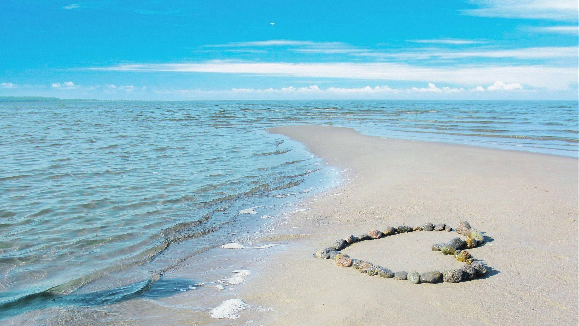 Love Nature Stones In Sand Background