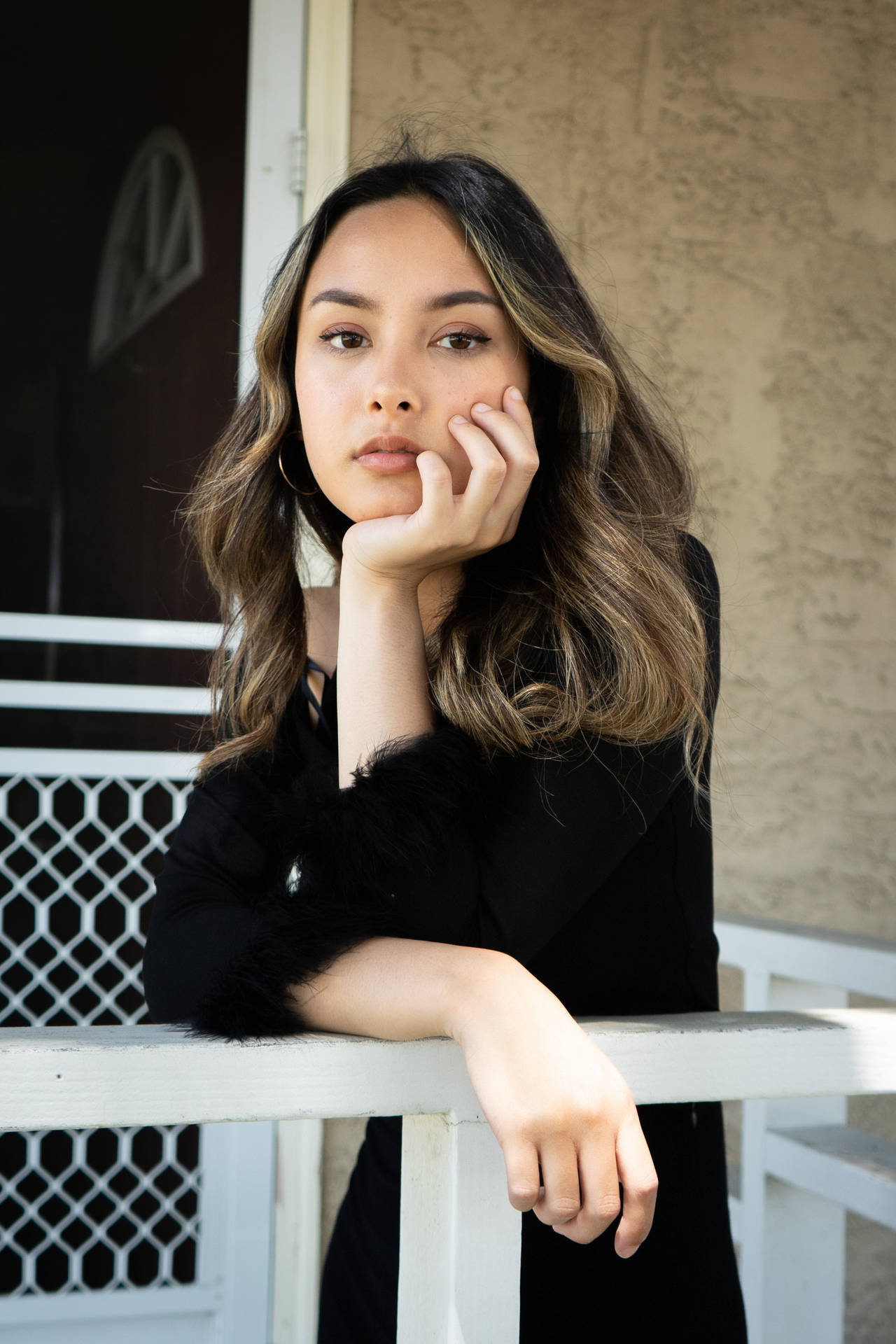 Lovely Girl On White Railing Background