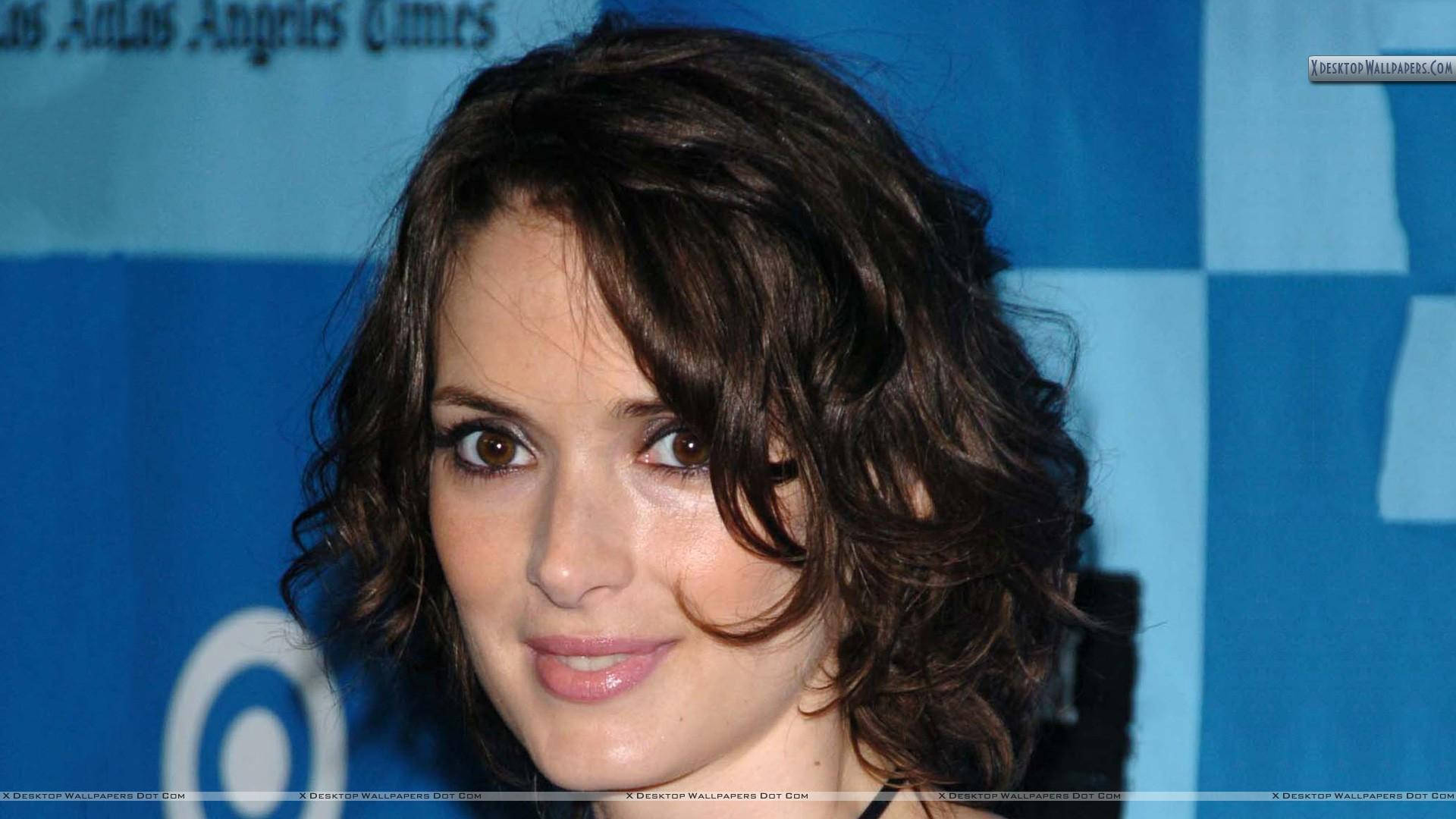 Lovely Winona Ryder Background