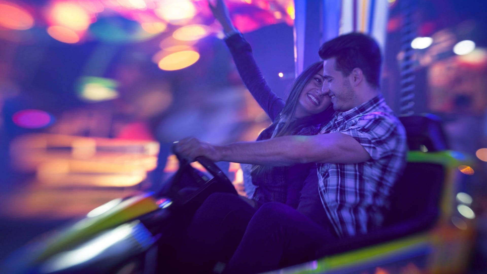 Lovers In A Theme Park Background