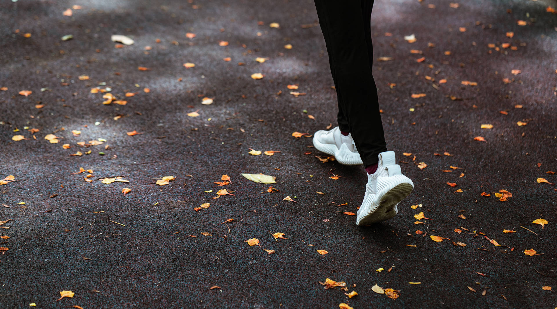 Lower Body Dark Pavement Background