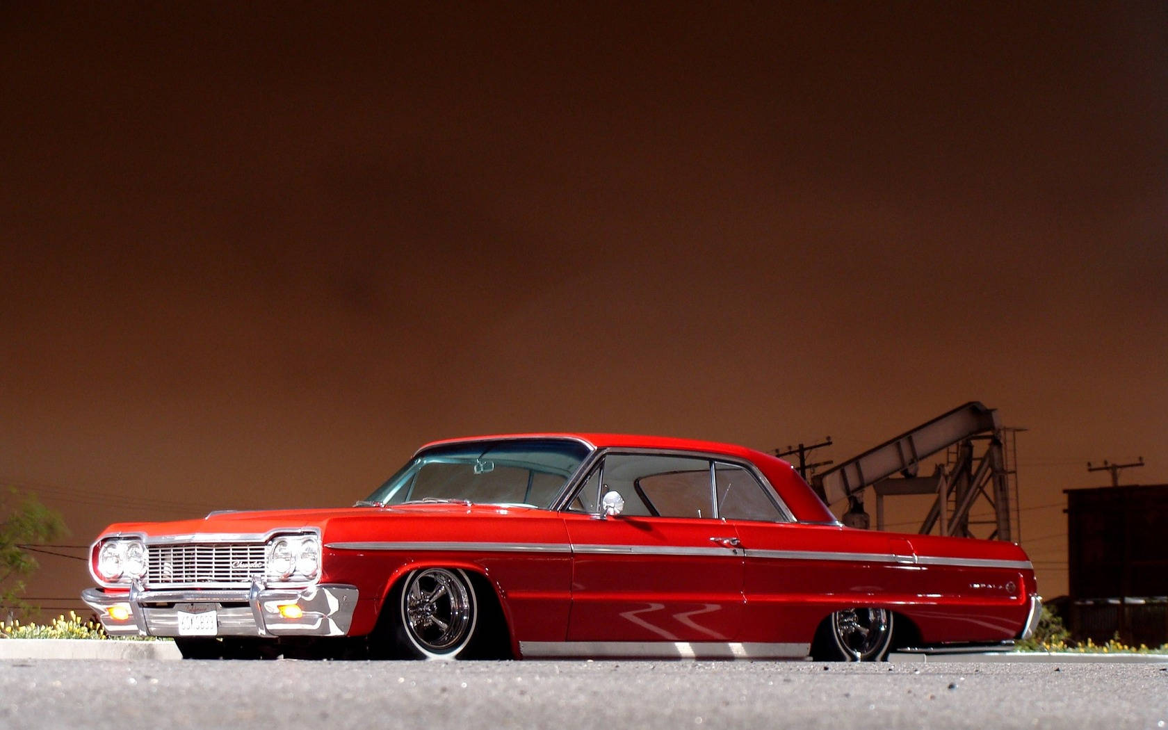 Lowrider Impala Against Brown Sky Background