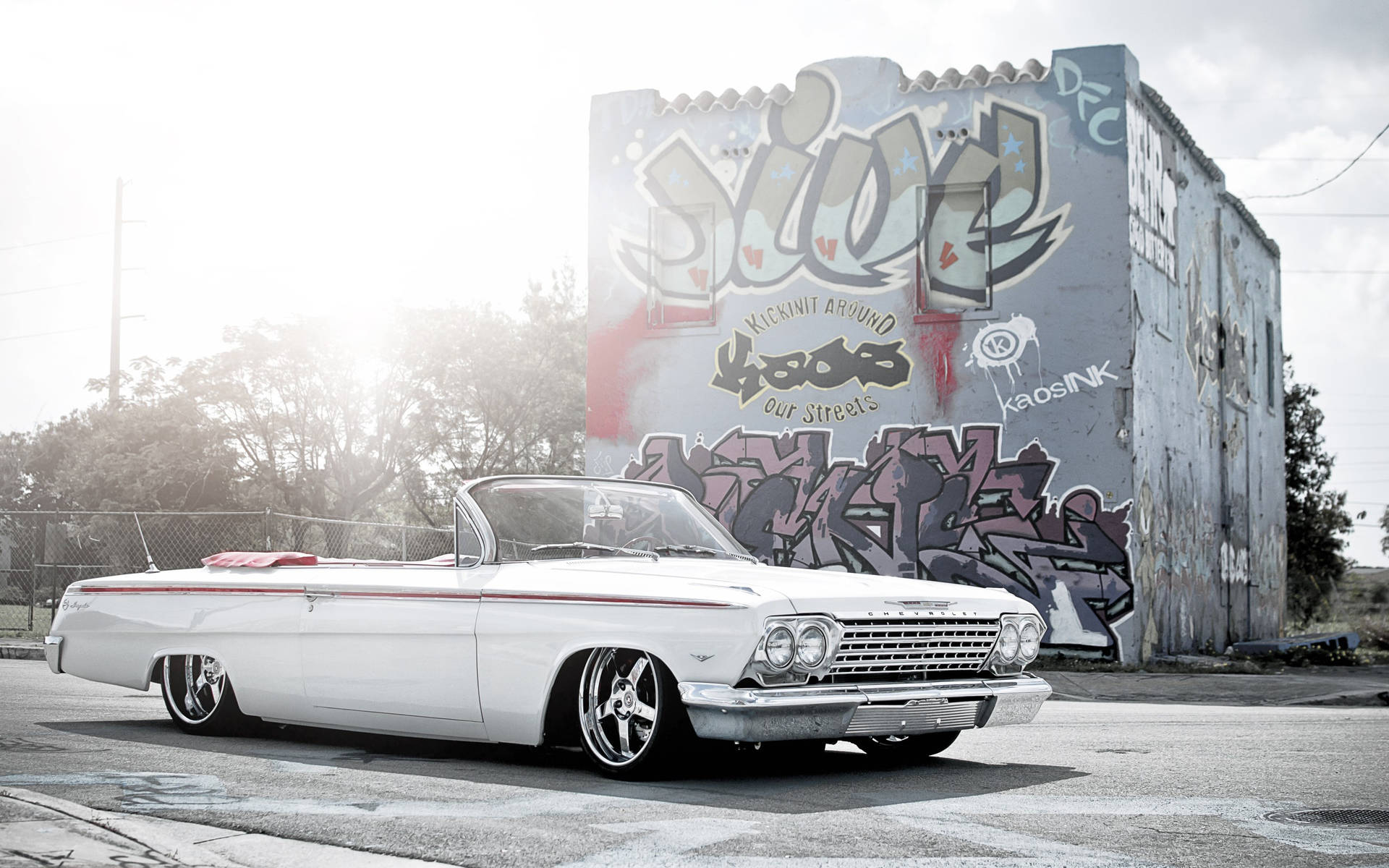 Lowrider White Impala On Outskirts Background