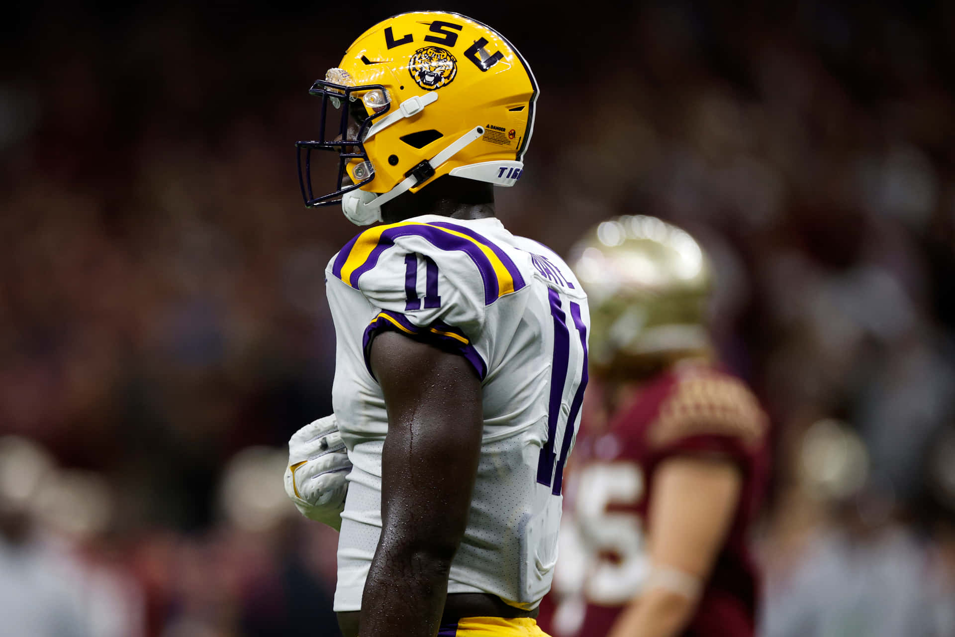 Lsu Football Player Standing Background