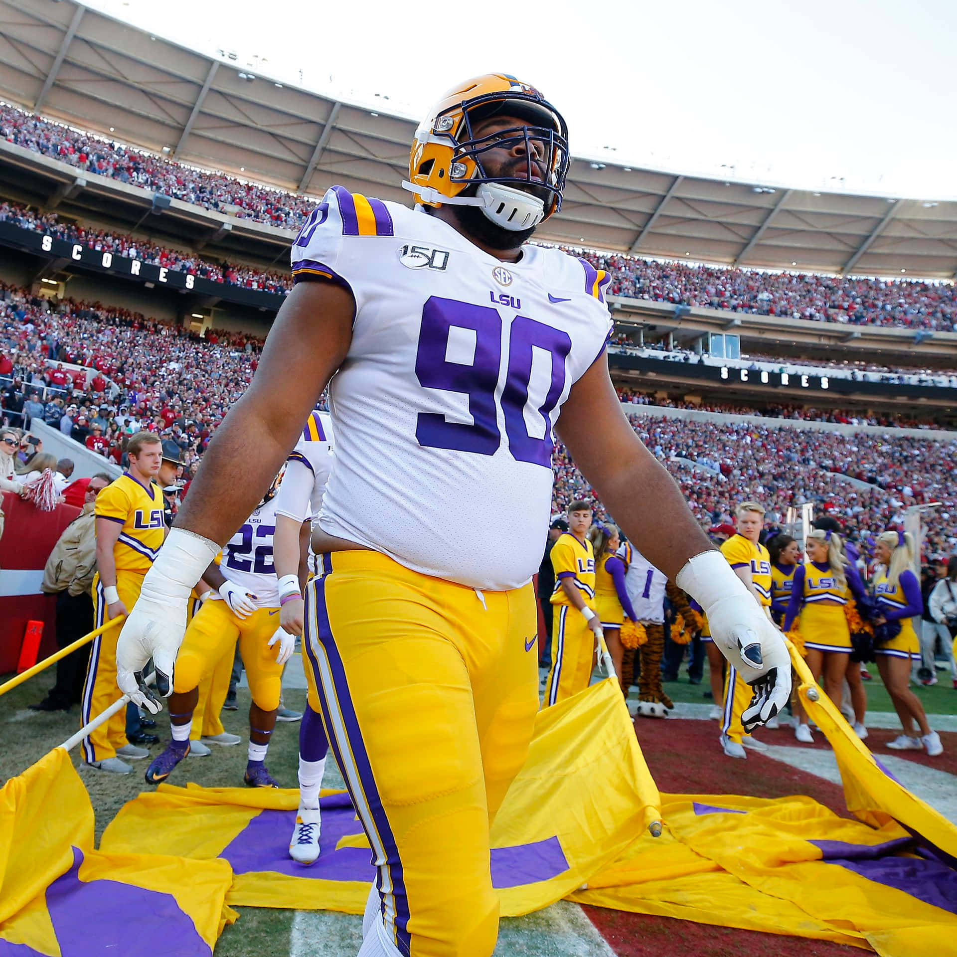 Lsu Football Player Walking Background