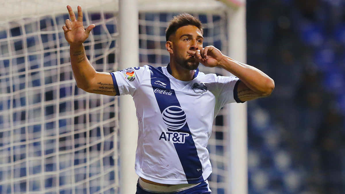 Lucas Cavallini Celebrating Goal Soccer Match Background