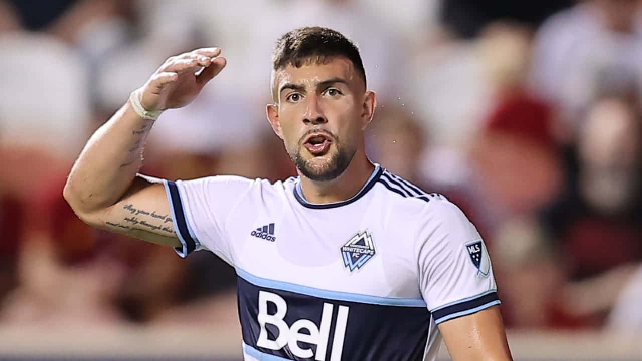 Lucas Cavallini Soccer Player Action Shot Background