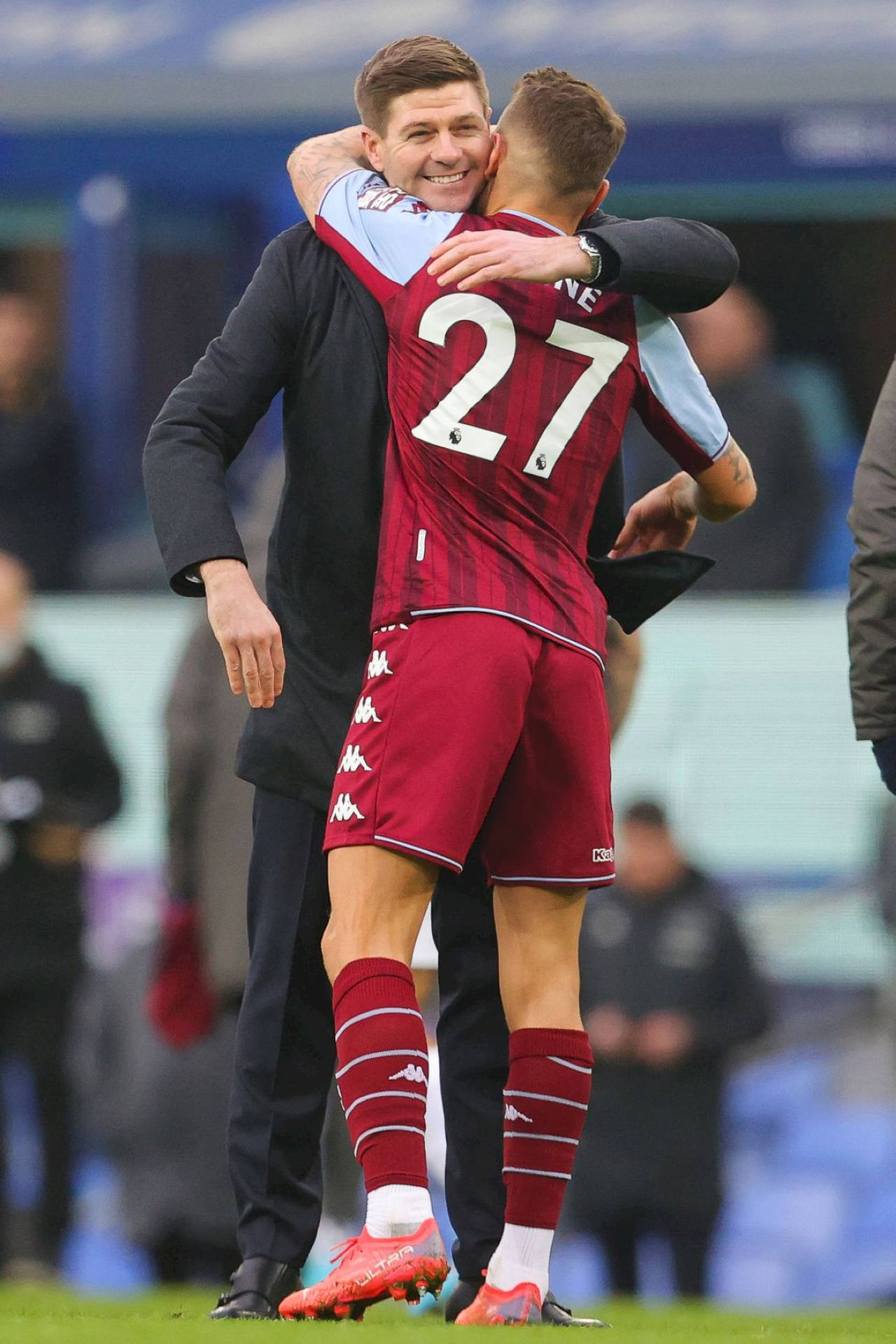 Lucas Digne And Steven Gerrard Hug Background