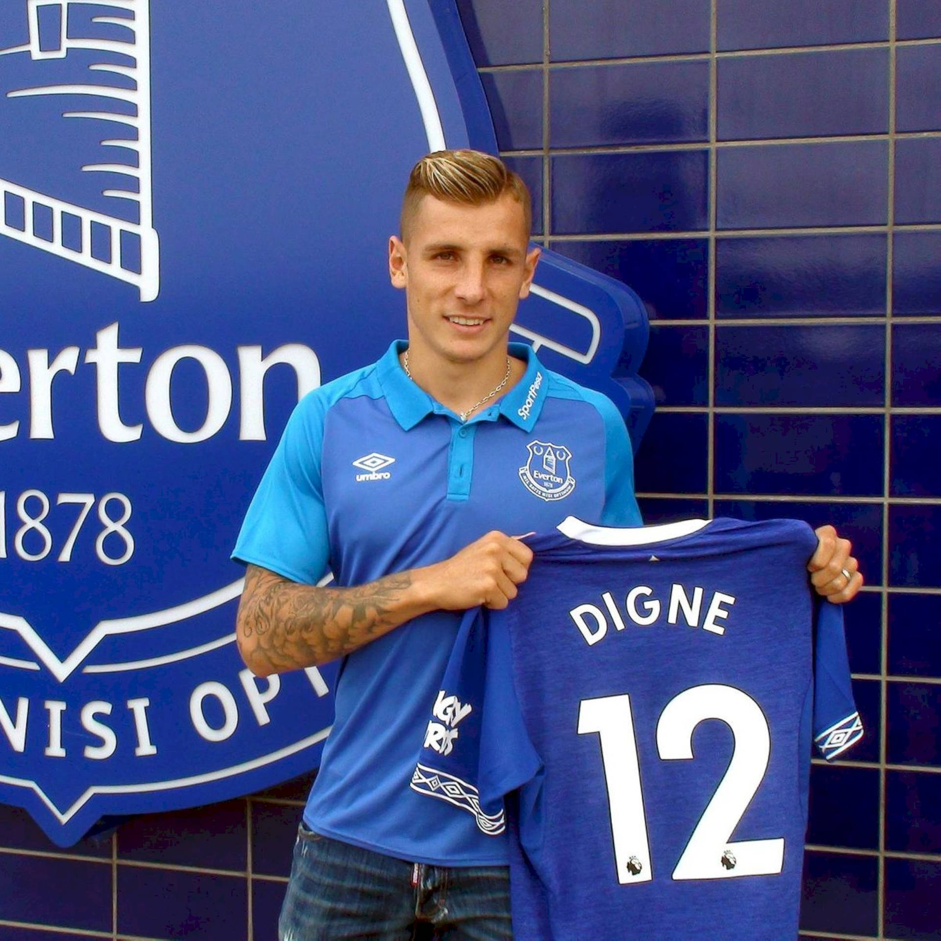 Lucas Digne Holding Everton Jersey Background