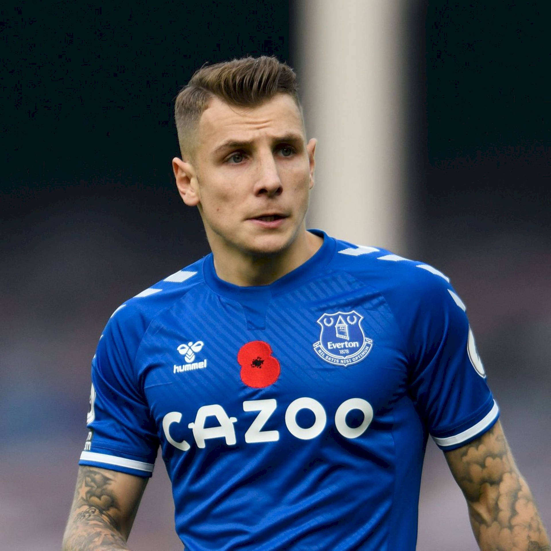 Lucas Digne Wearing Blue Everton Jersey Background