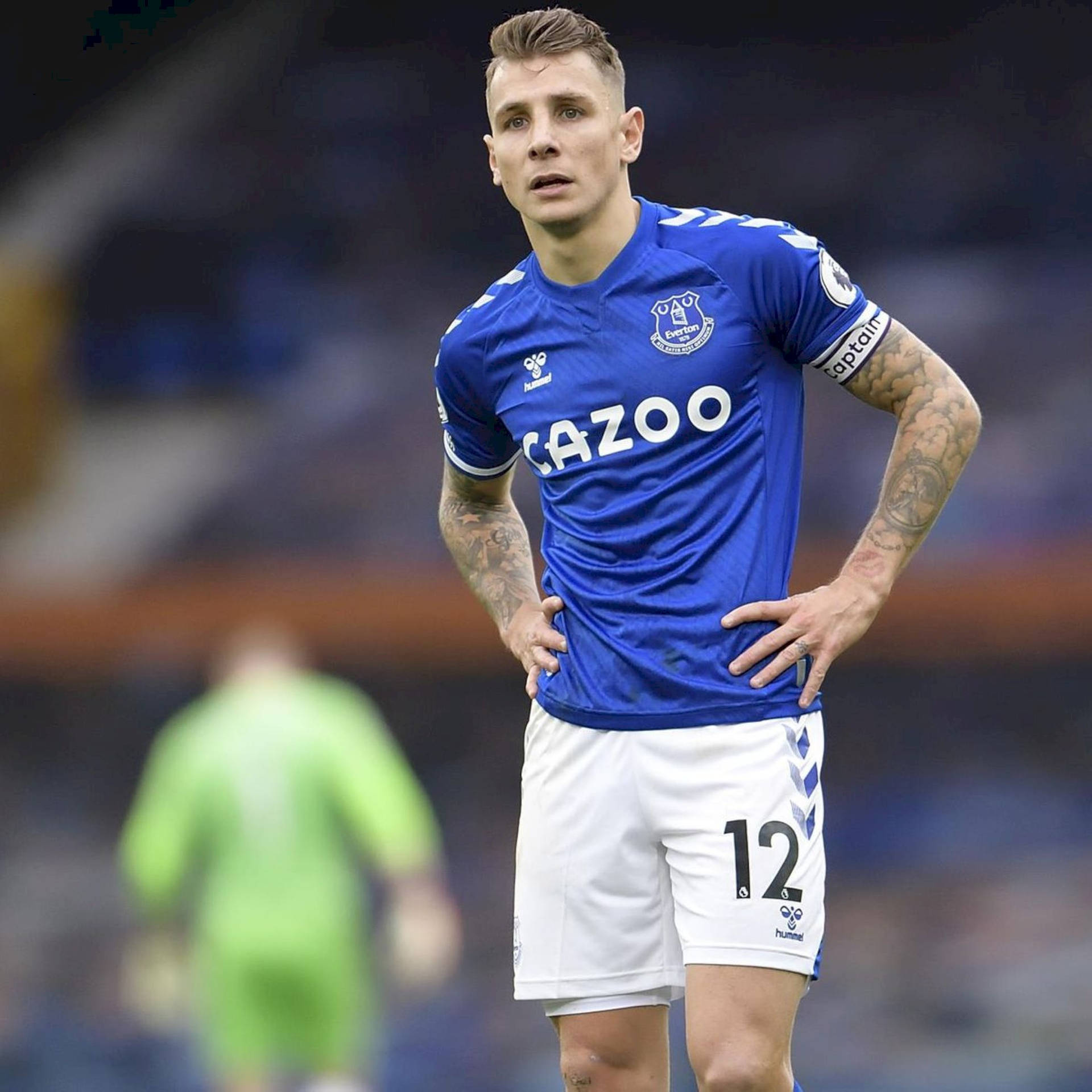 Lucas Digne With Hands On Hips Background