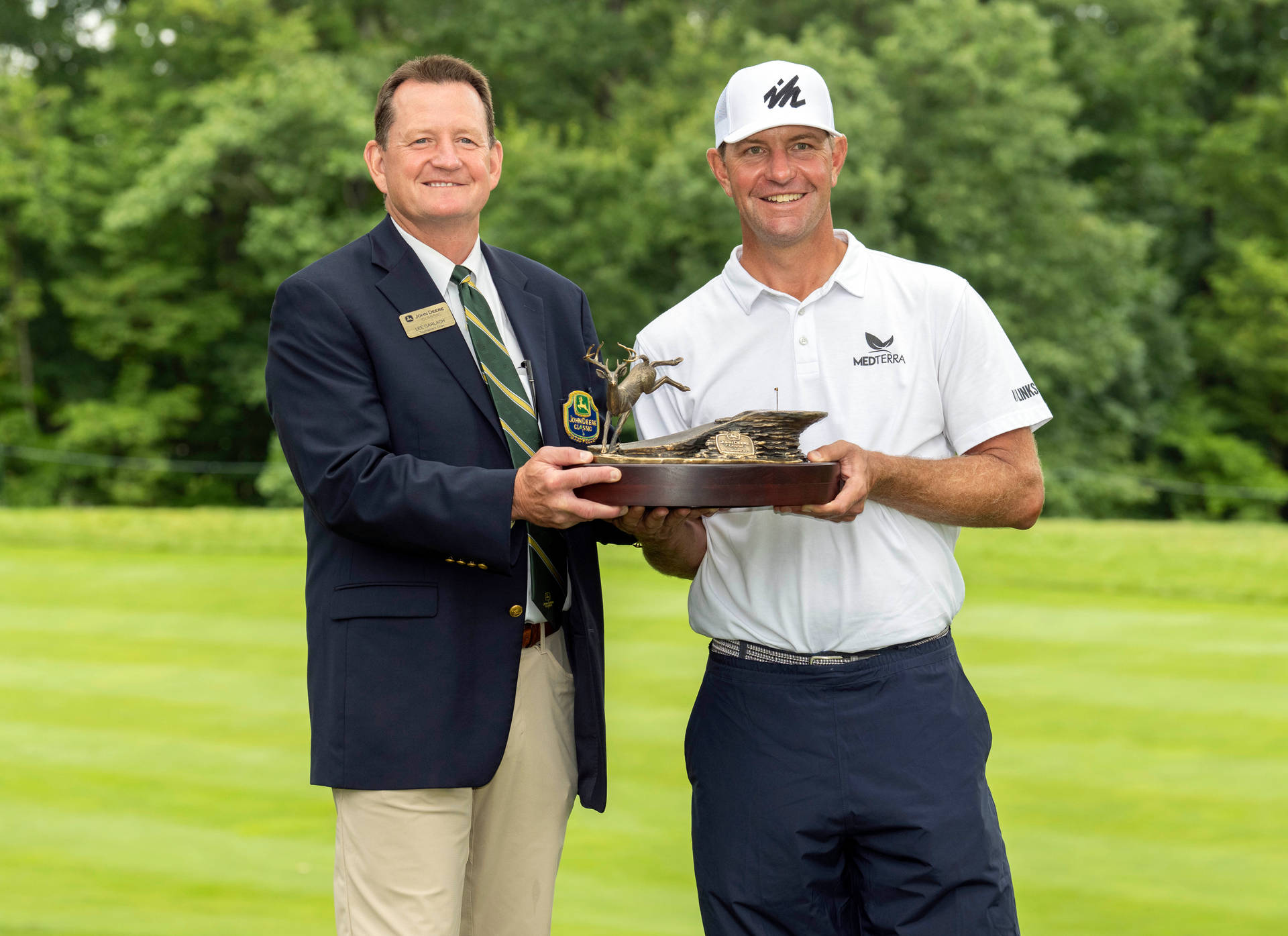 Lucas Glover Presented With Trophy Background