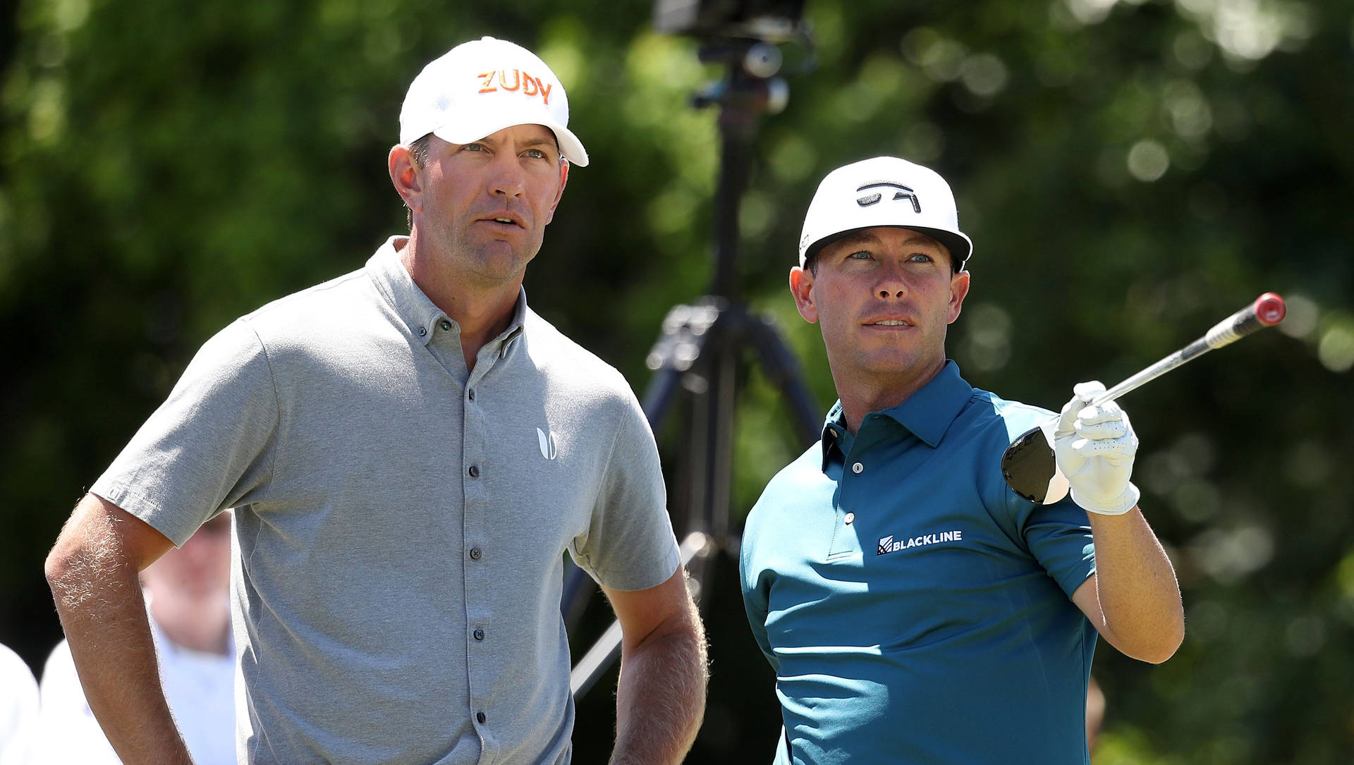 Lucas Glover Talking To Golfer Background