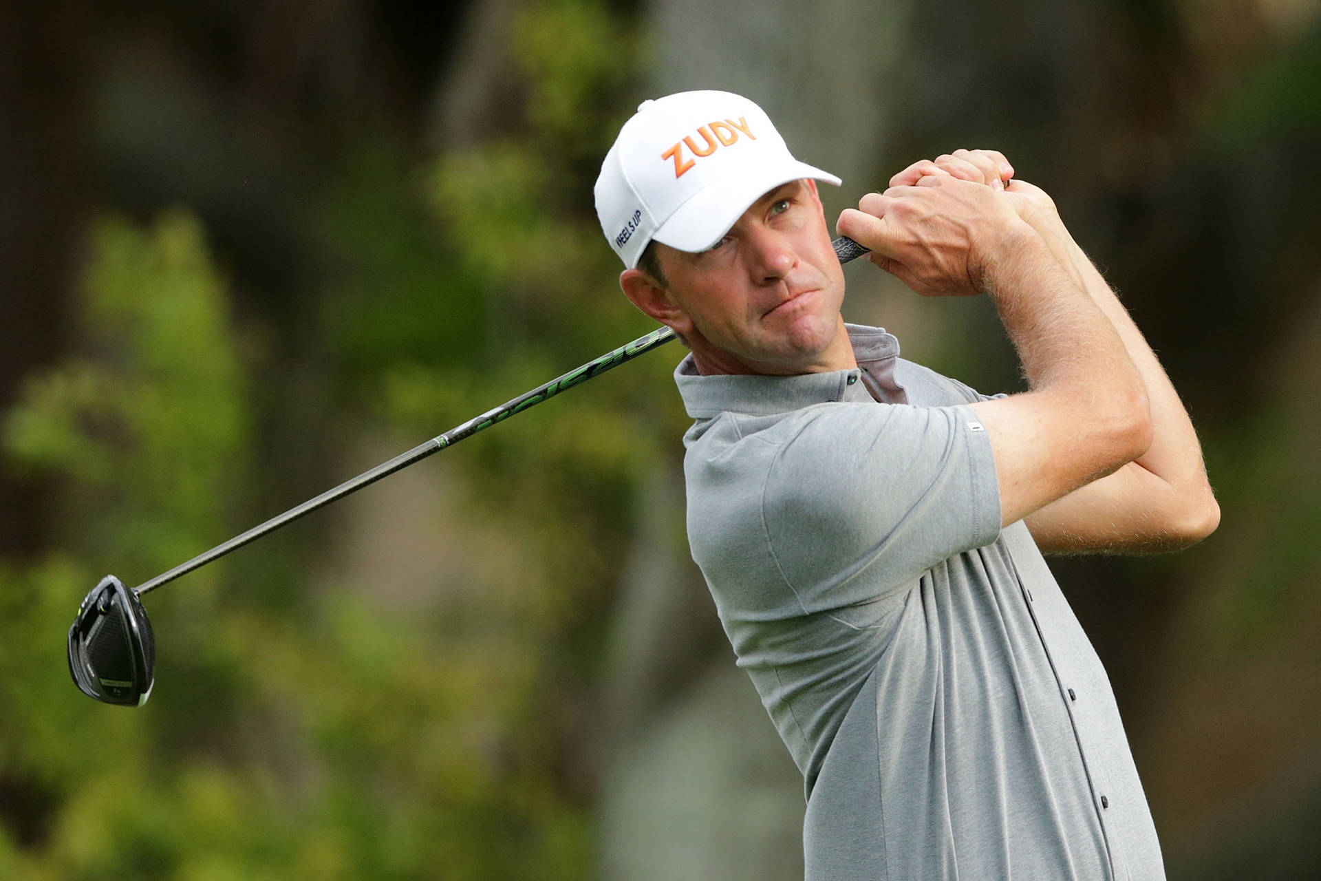 Lucas Glover With Golf Club Background