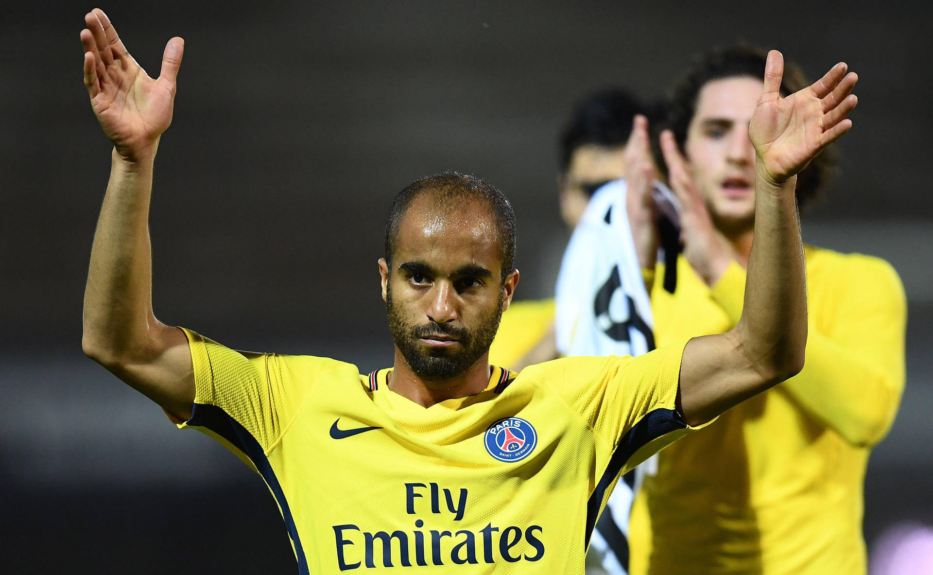 Lucas Moura In Yellow Jersey Background