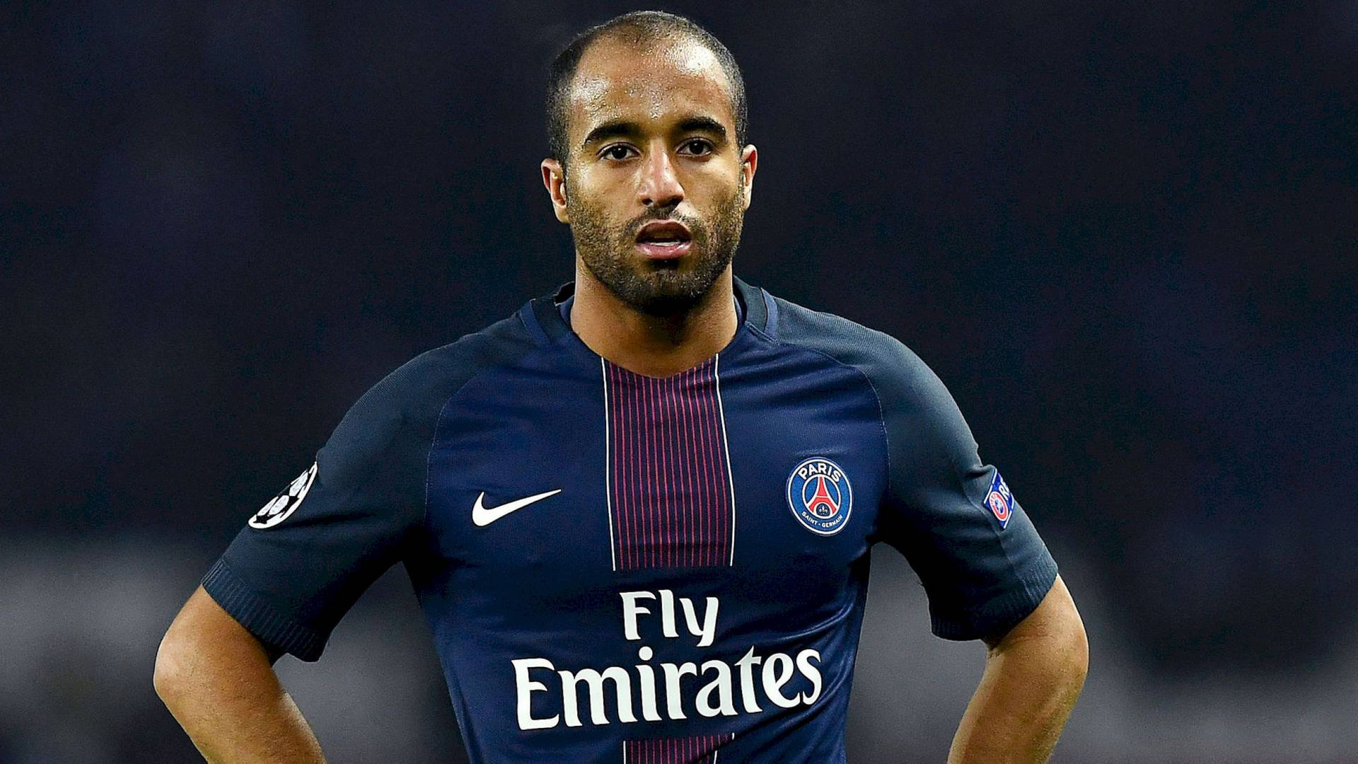 Lucas Moura Wearing Dark Blue Jersey Background