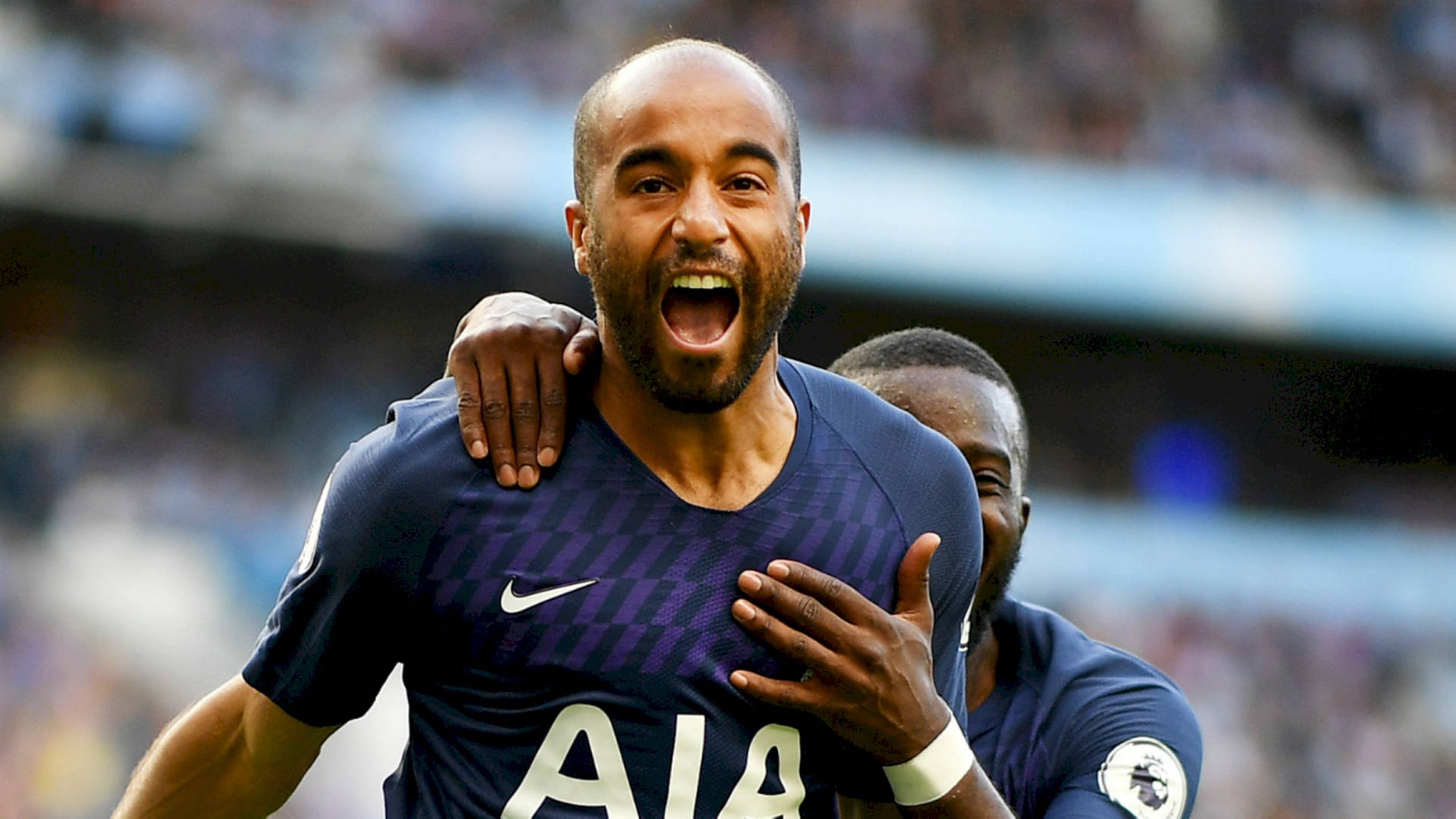 Lucas Moura Yelling With Teammate Background