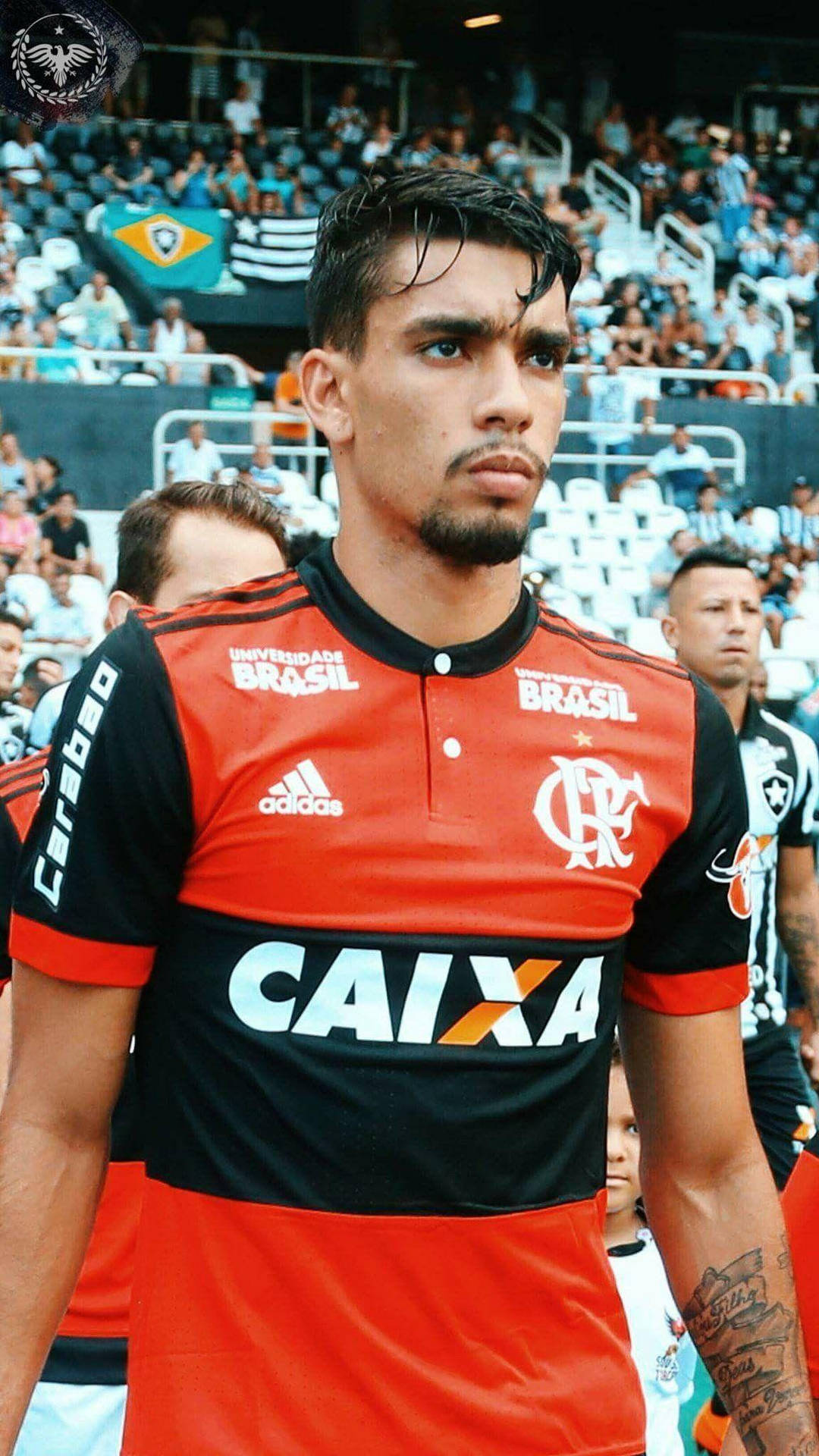 Lucas Paquetá With A Serious Expression Background