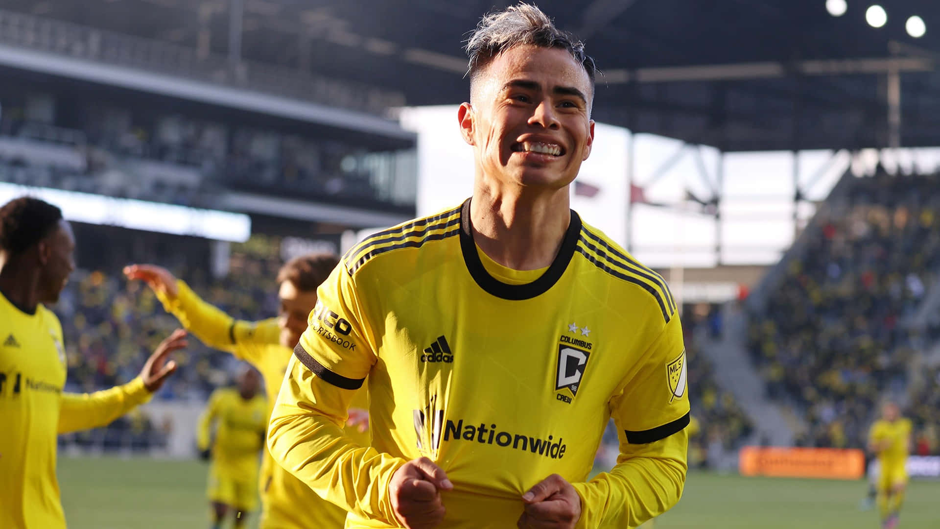 Lucas Zelarayan Smiling On The Field Background