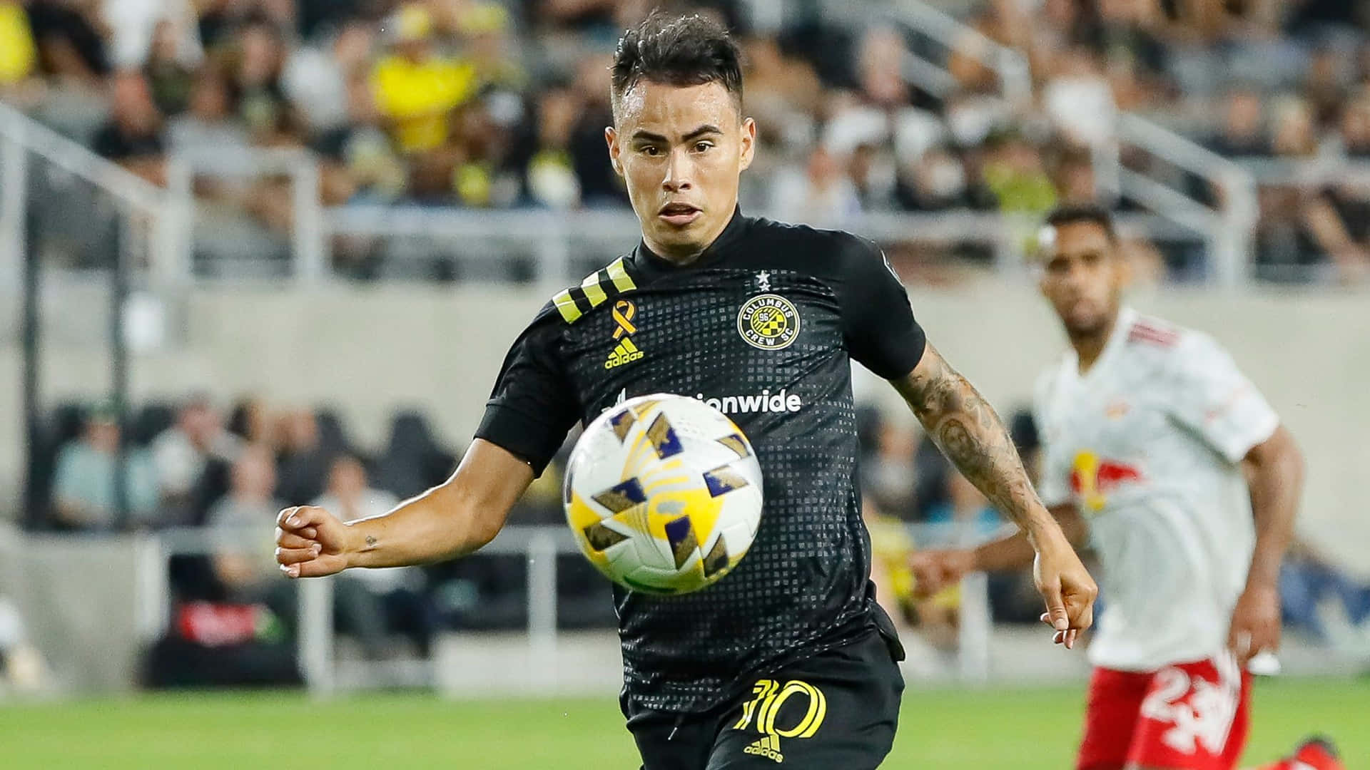 Lucas Zelarayan With The Football Background
