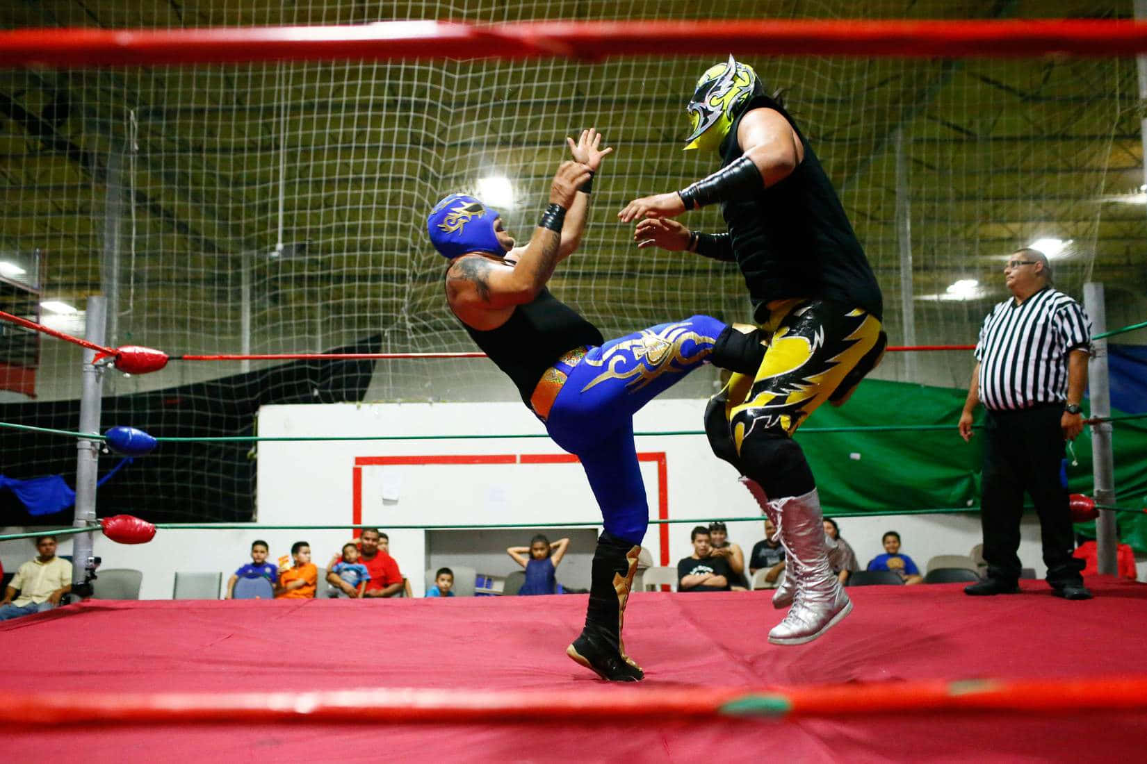 Lucha Libre Action In Ring Background