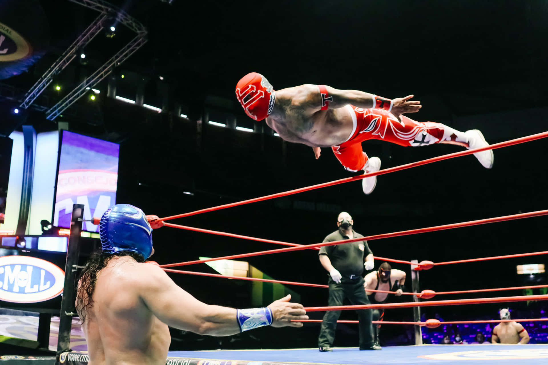 Luchador Mid Air Dive Wrestling Match