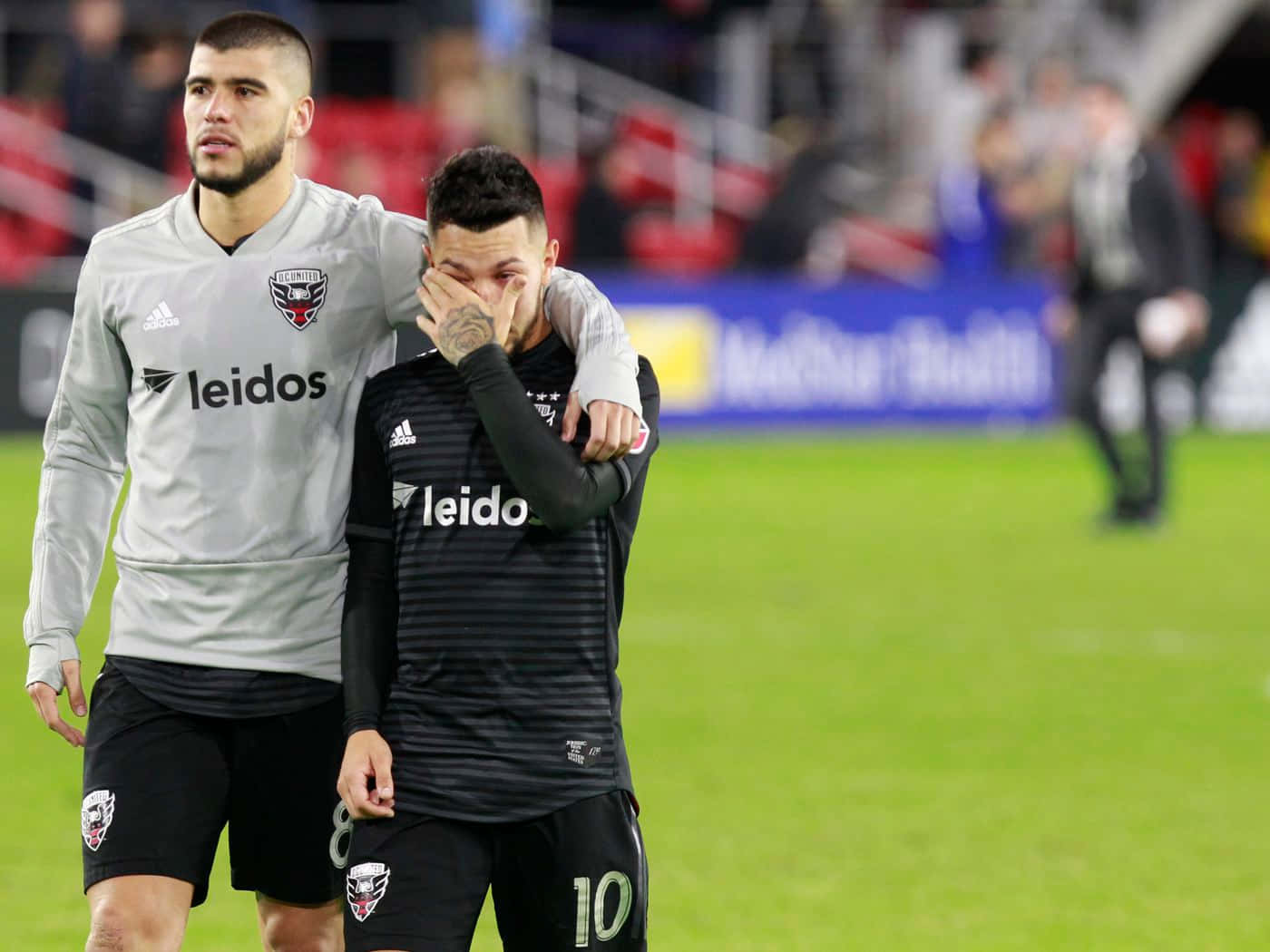 Luciano Acosta And Teammate Wayne Rooney Background