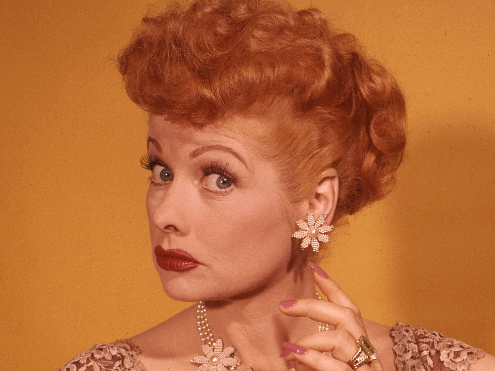 Lucille Ball Pouting In Color Background