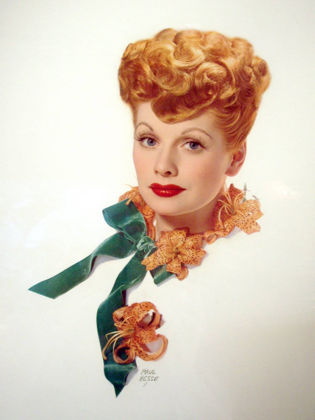 Lucille Ball With Flowers And Ribbon Background