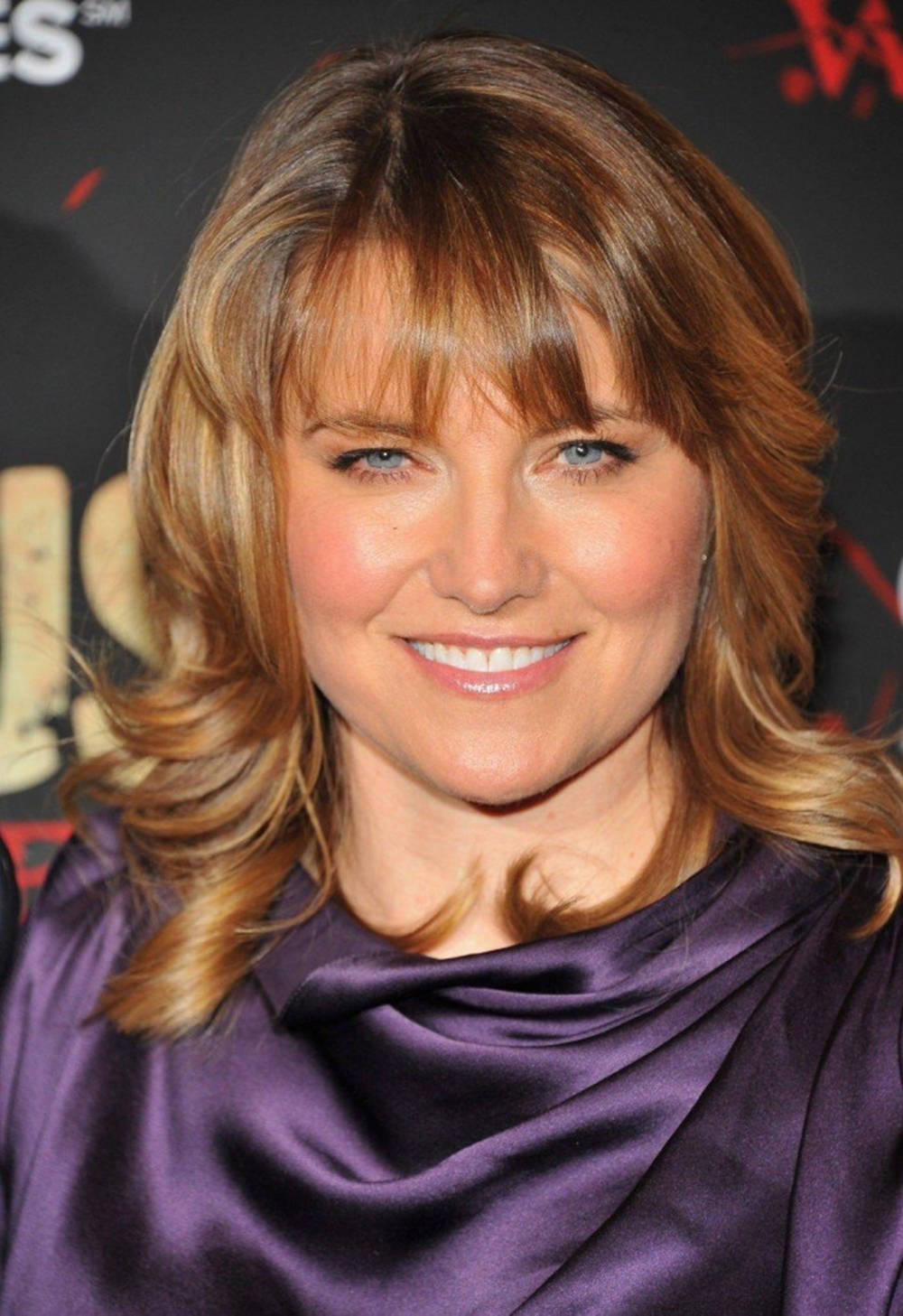 Lucy Lawless Purple Satin Top Background