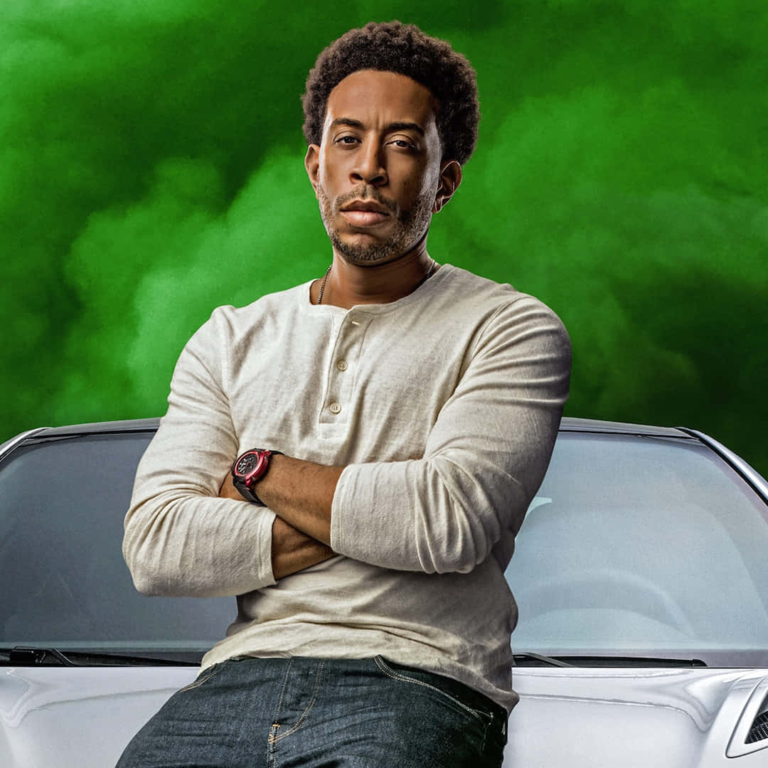 Ludacris Confident Pose With Car Background