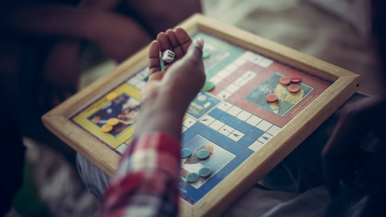 Ludo King Dice In Hand Background