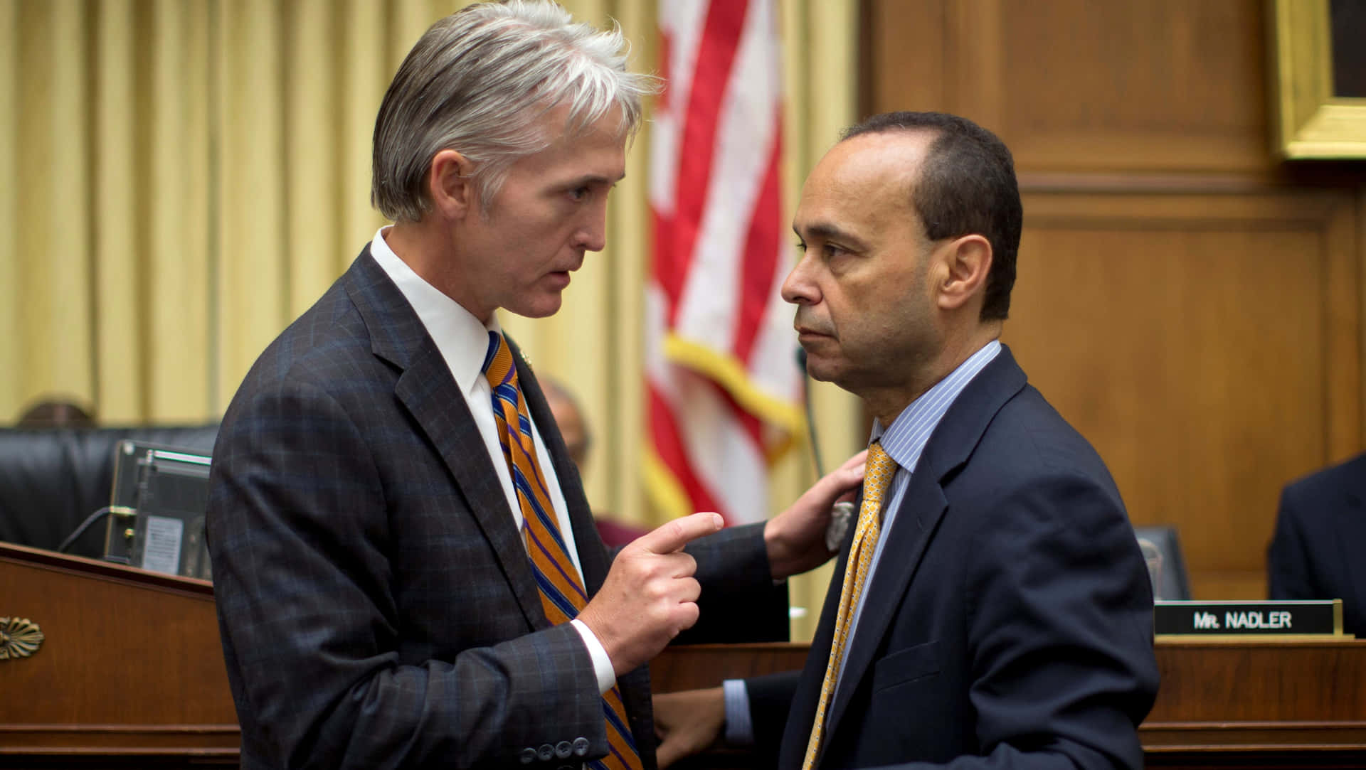 Luis Gutiérrez Talking To A Man Background