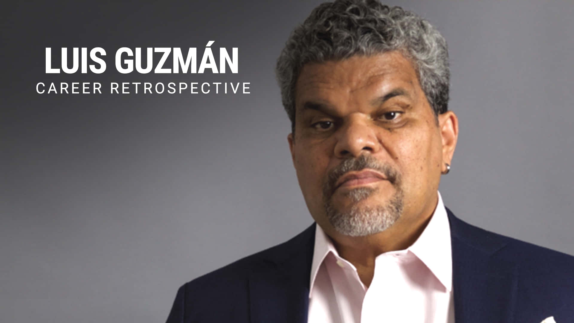 Luis Guzmán Background