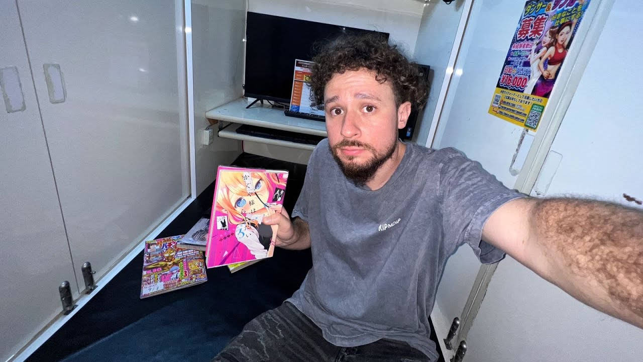 Luisito Comunica Holding A Manga Background