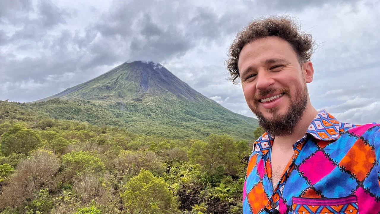 Luisito Comunica With Arenal Volcano Background