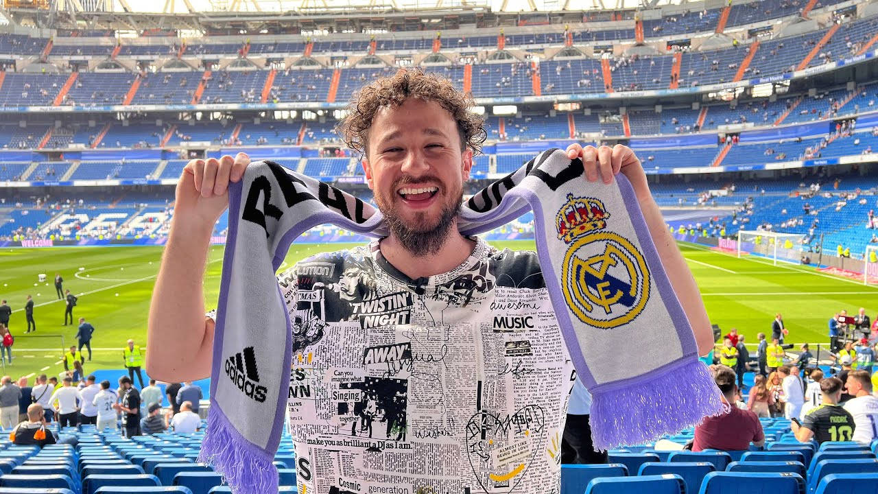 Luisito Comunica With Madrid Scarf Background